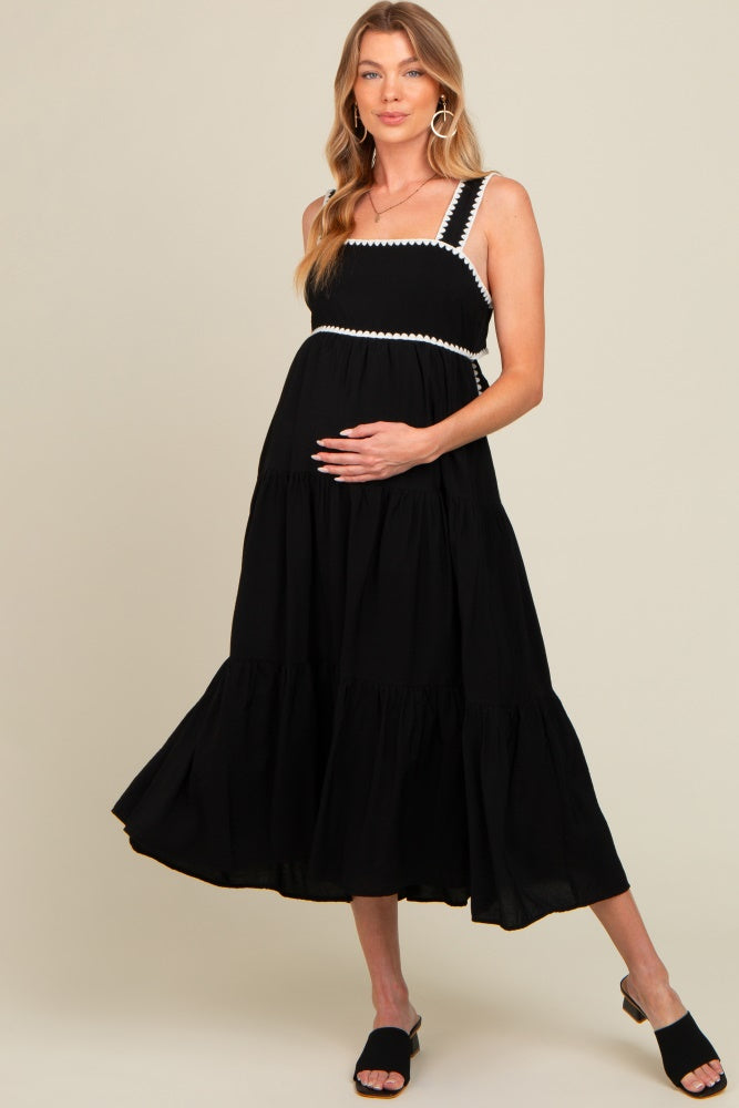Umstands-Midikleid mit Wellenborte und Stufenrock in Schwarz