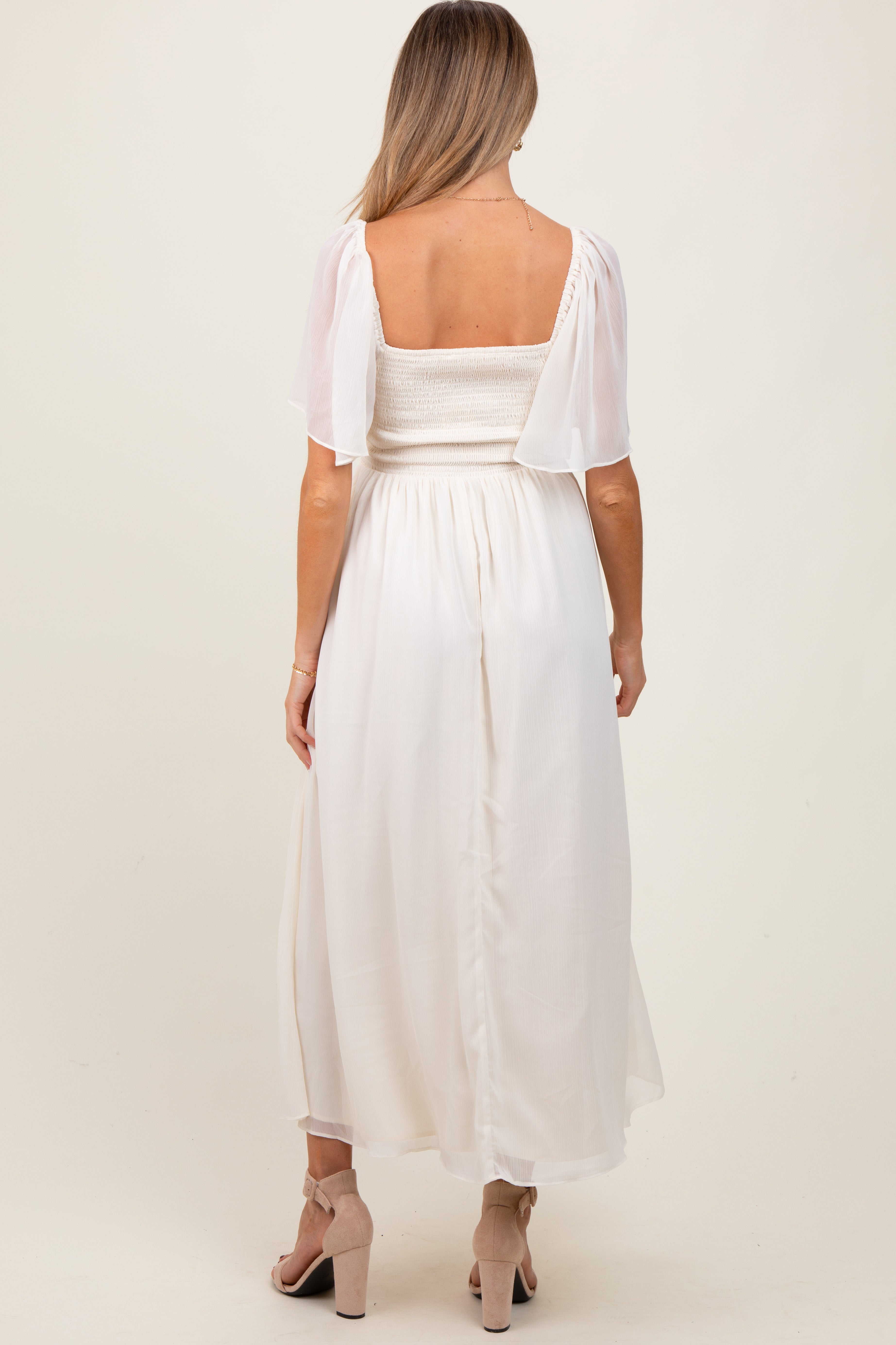 Umstands-Midikleid in Creme mit floraler Applikation und Flügelärmeln