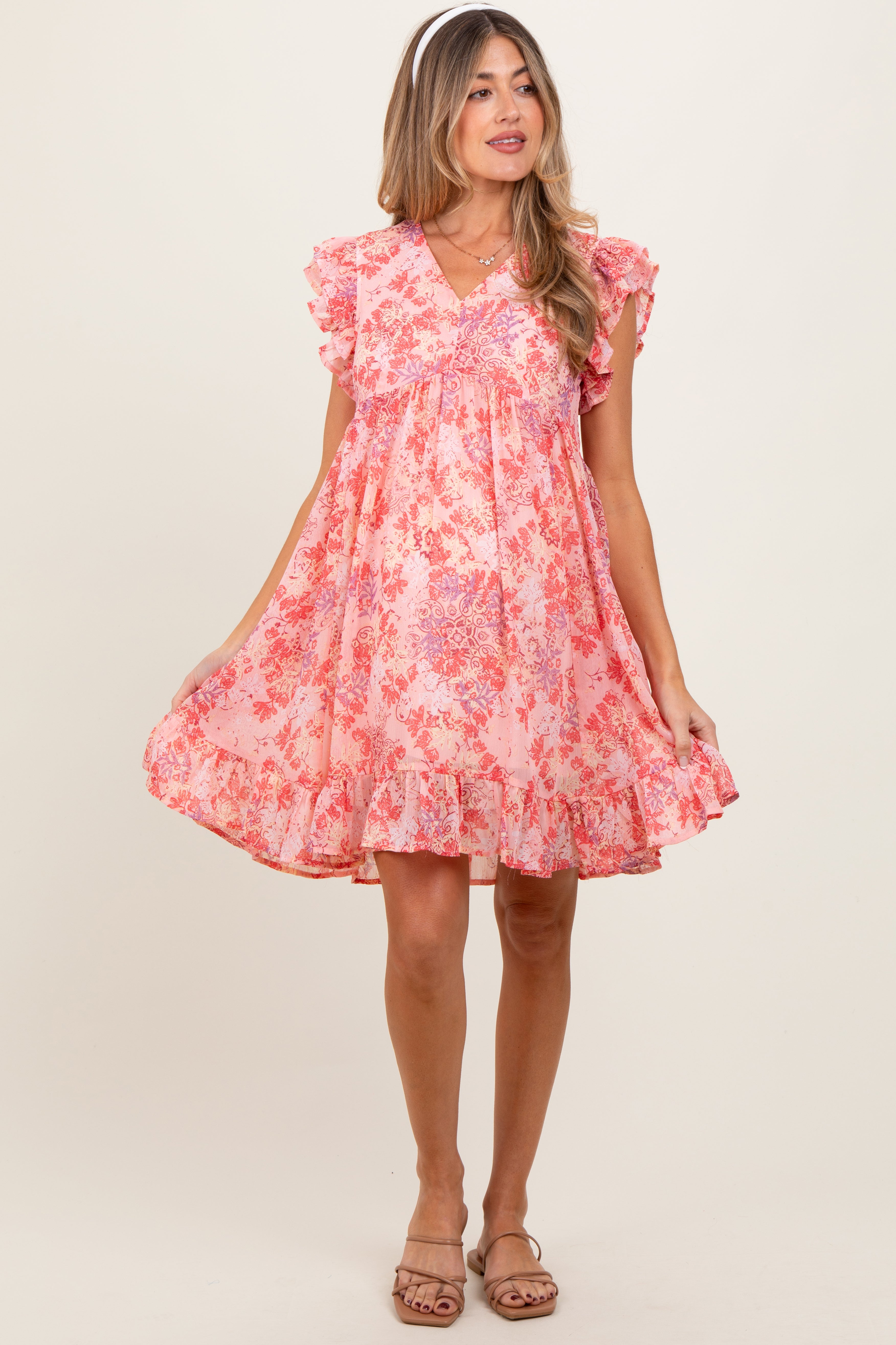 Geblümtes Umstands-Kleid in Rosa aus Chiffon mit Rüschen und kurzen Ärmeln