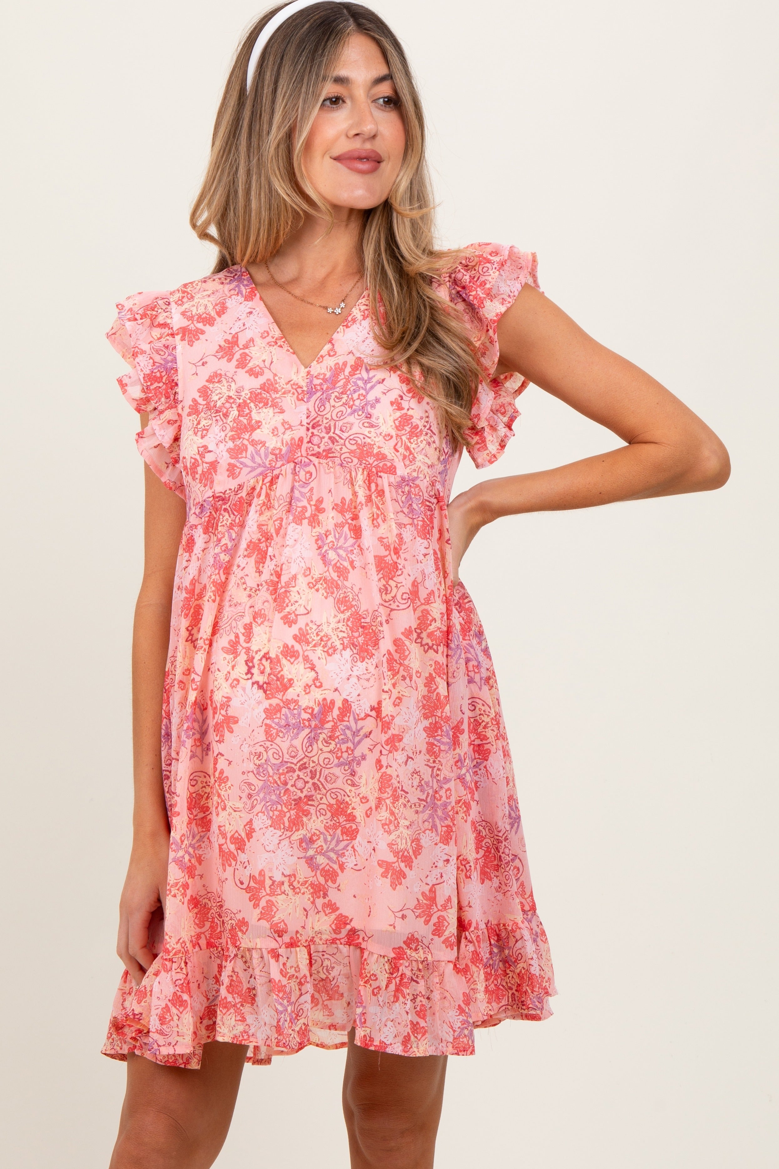 Geblümtes Umstands-Kleid in Rosa aus Chiffon mit Rüschen und kurzen Ärmeln