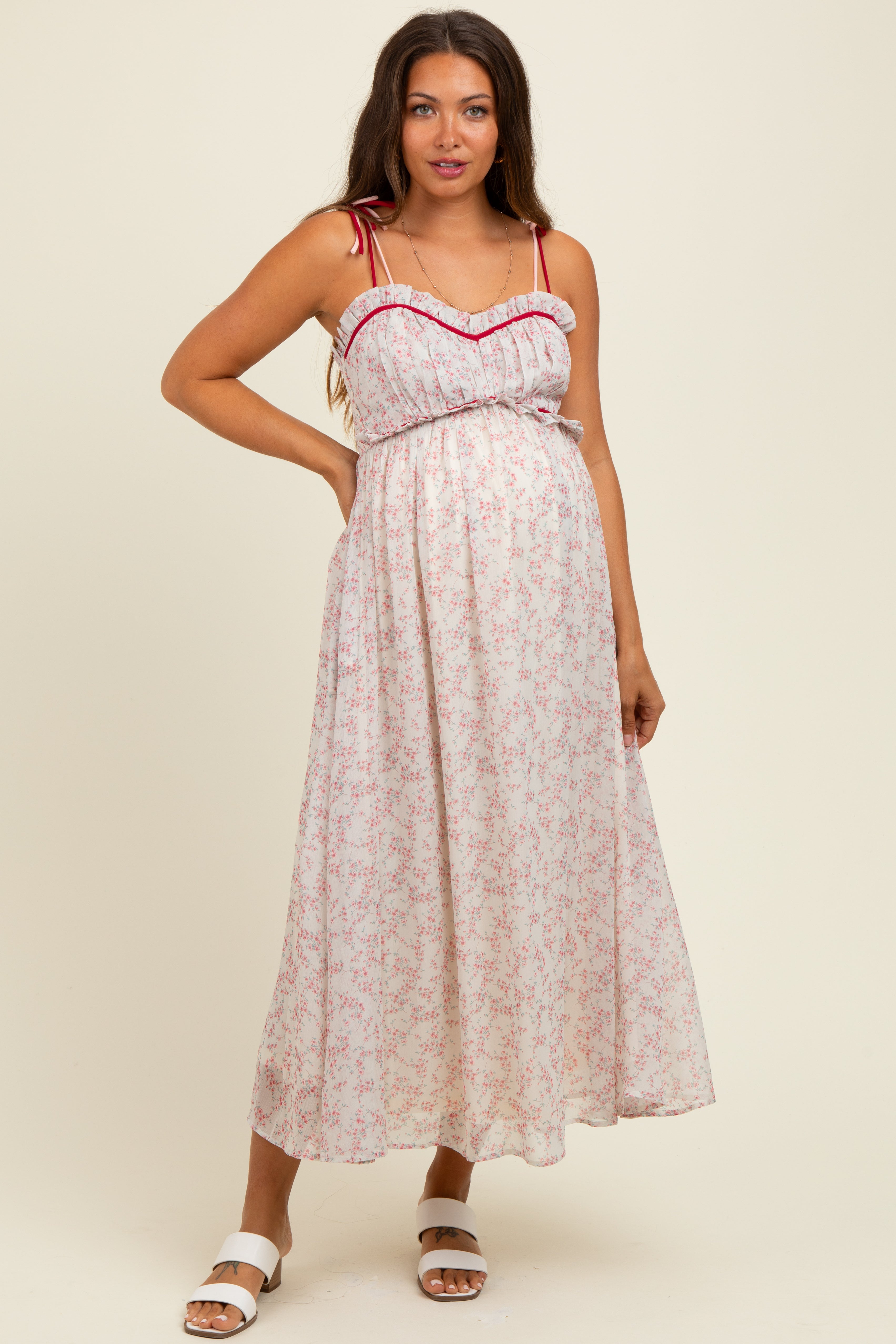 Rosa Umstands-Midikleid mit Blumenmuster und Schulterbändern