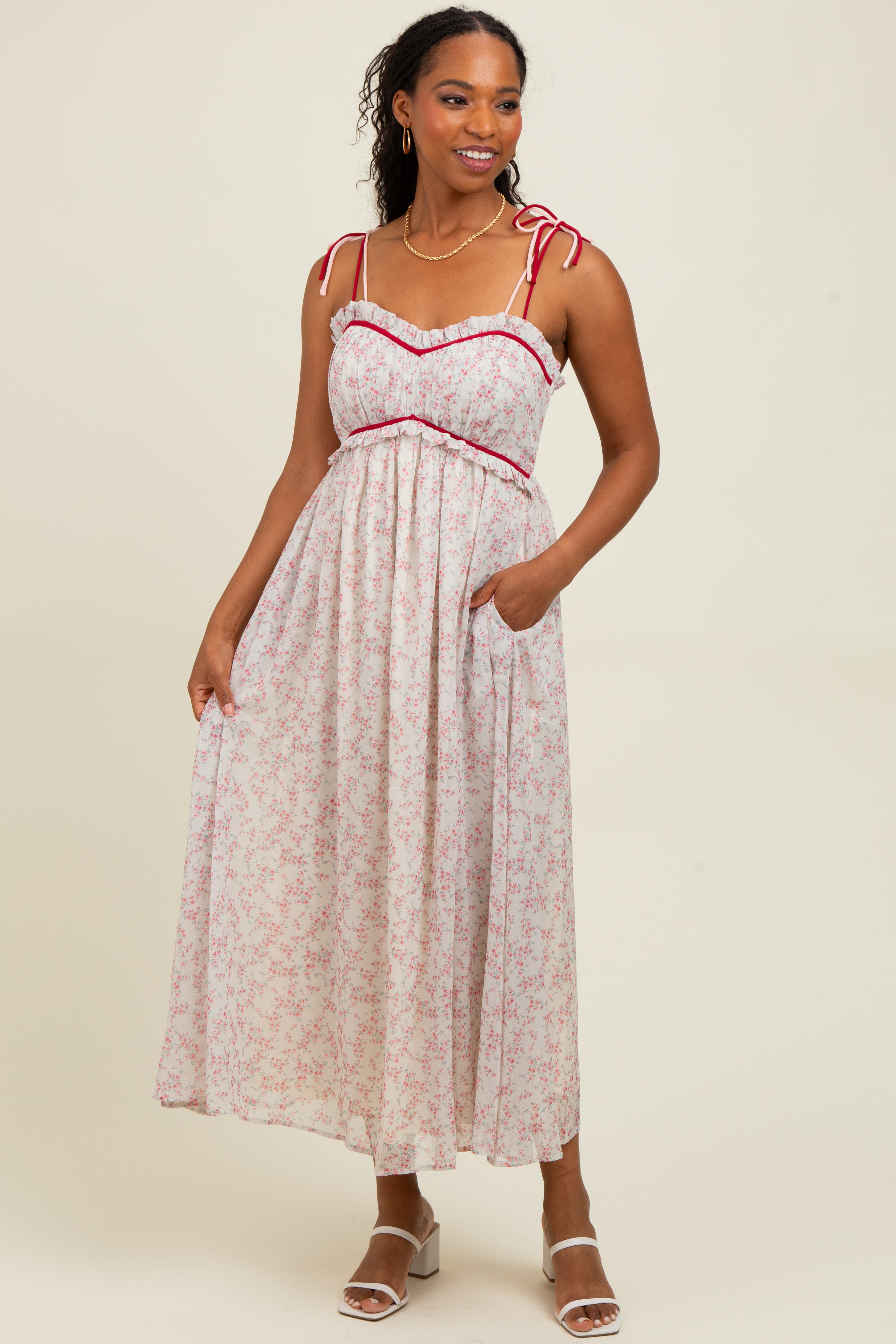 Rosa Umstands-Midikleid mit Blumenmuster und Schulterbändern