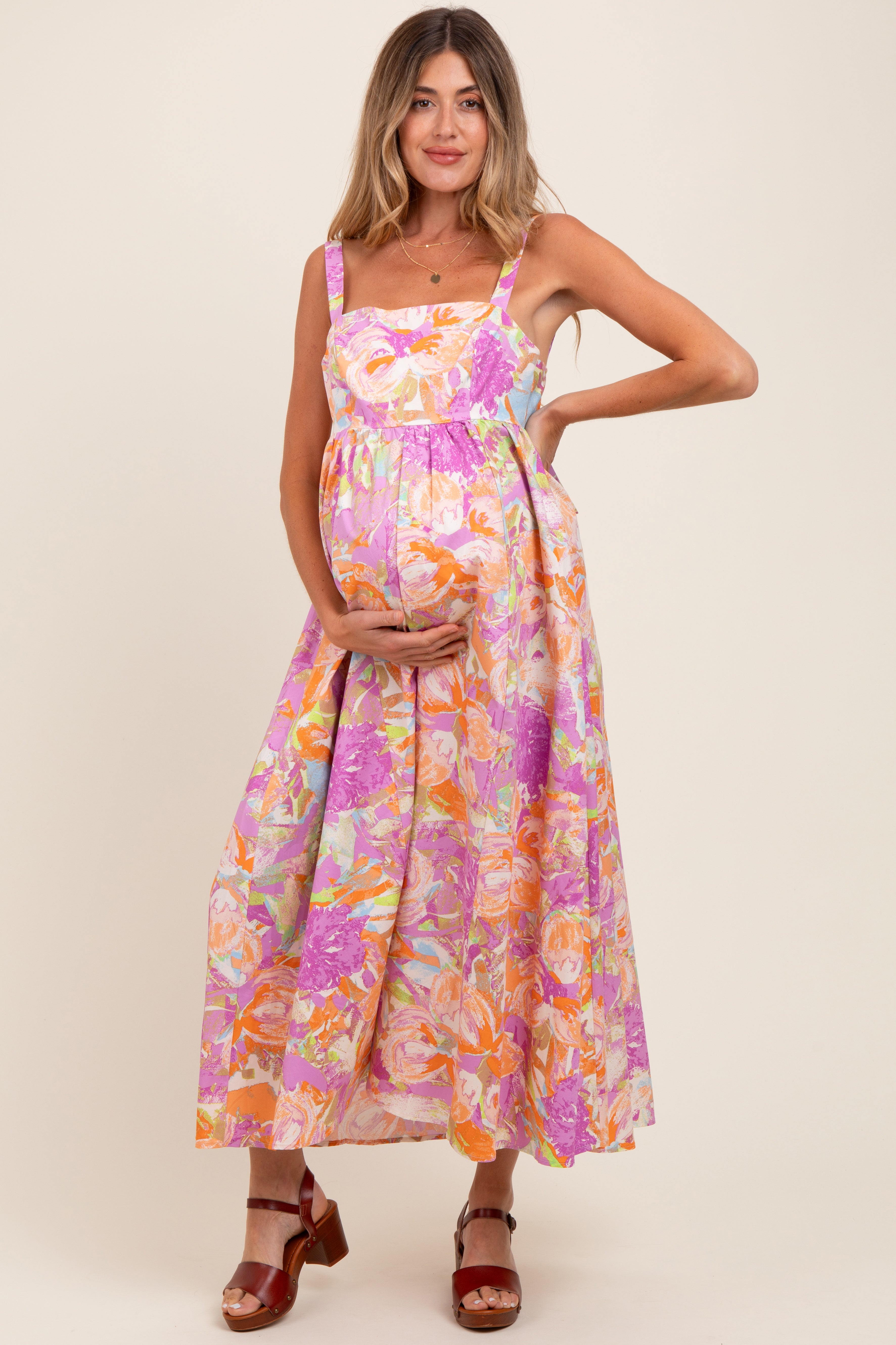 Rosa Umstands-Maxikleid mit Blumenmuster, Cut-out und Rückenbindung