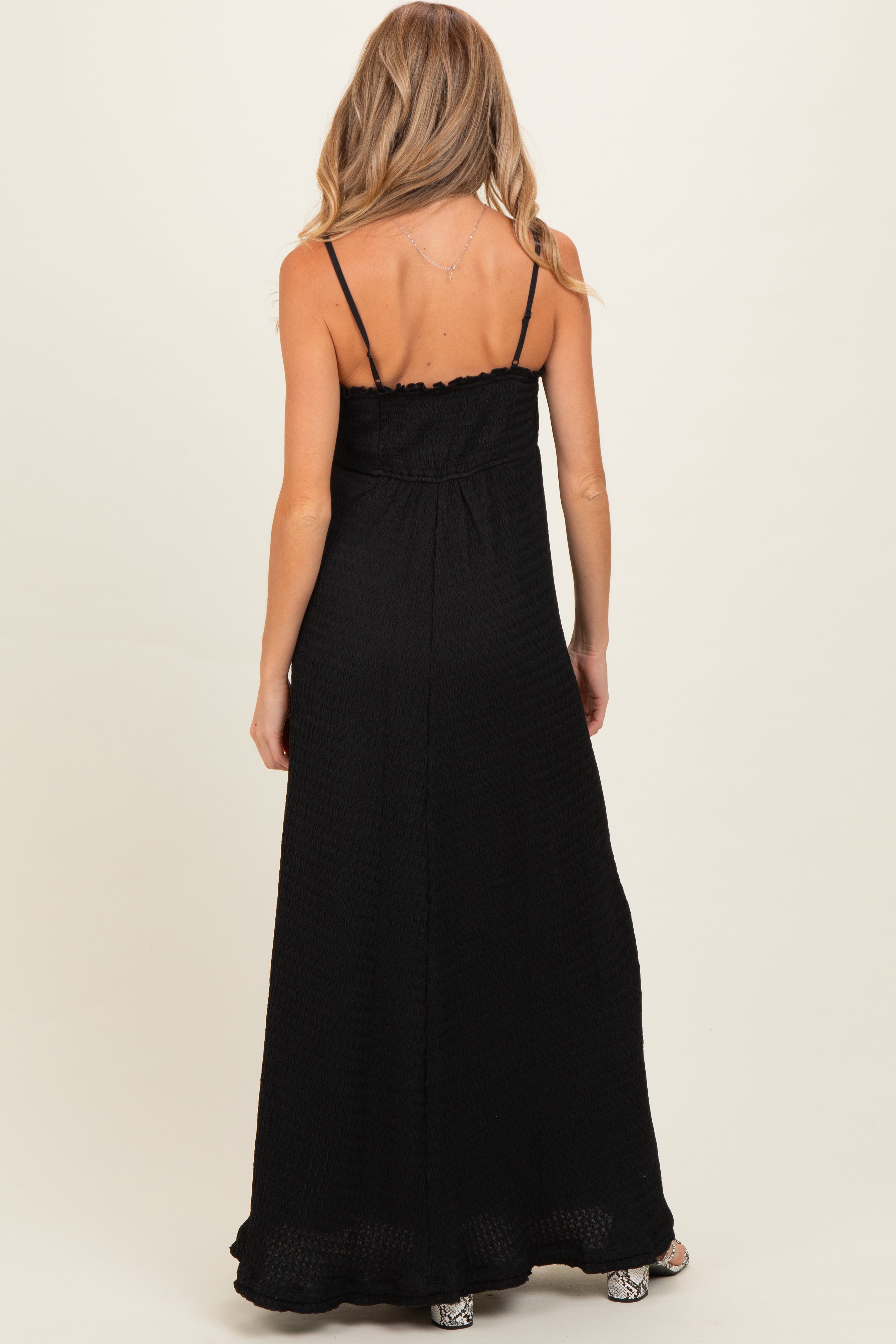 Schwarzes ärmelloses Umstands-Maxikleid aus Waffelstrick mit Herzausschnitt