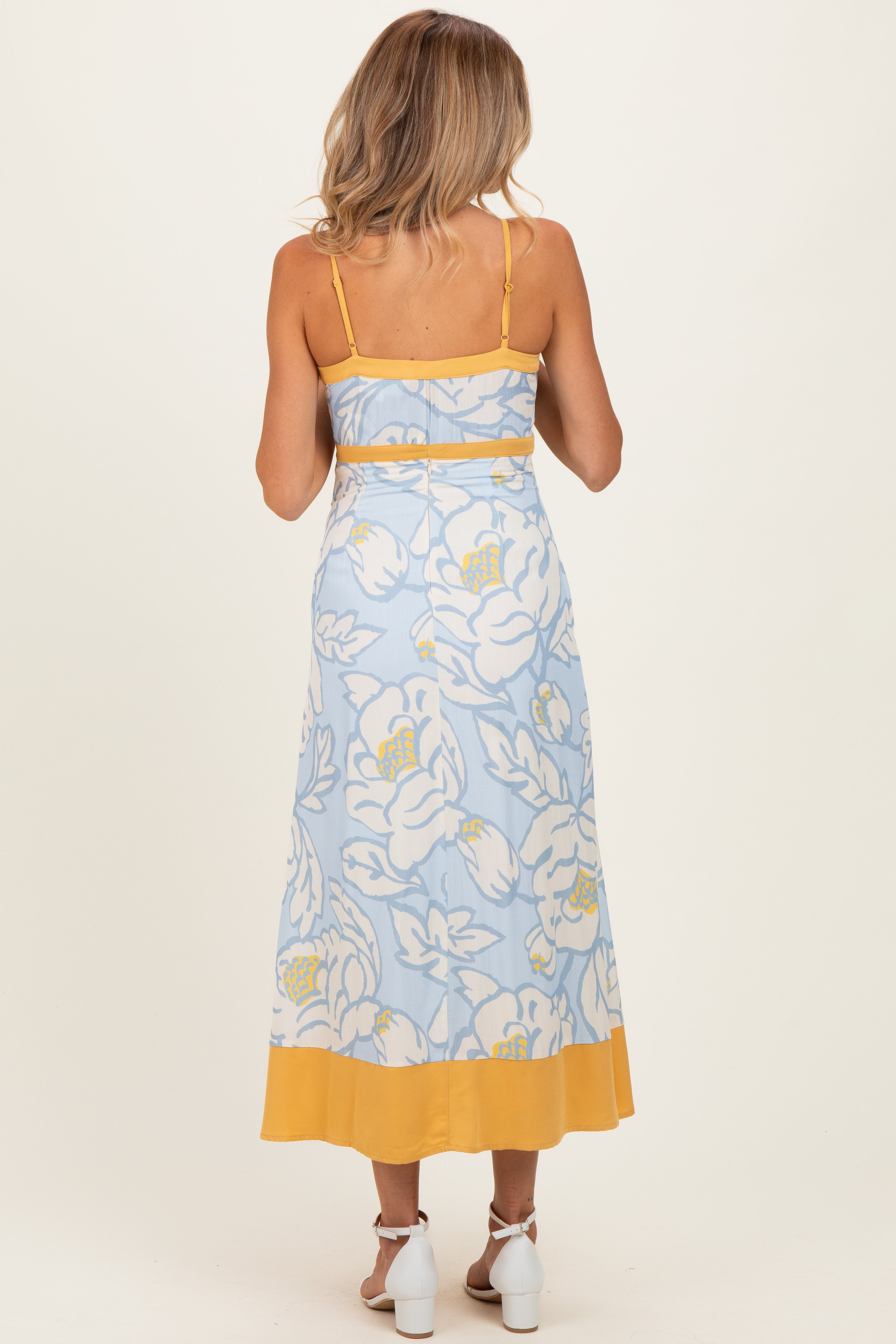 Ärmelloses fließendes Umstands-Maxikleid mit Blumenmuster
