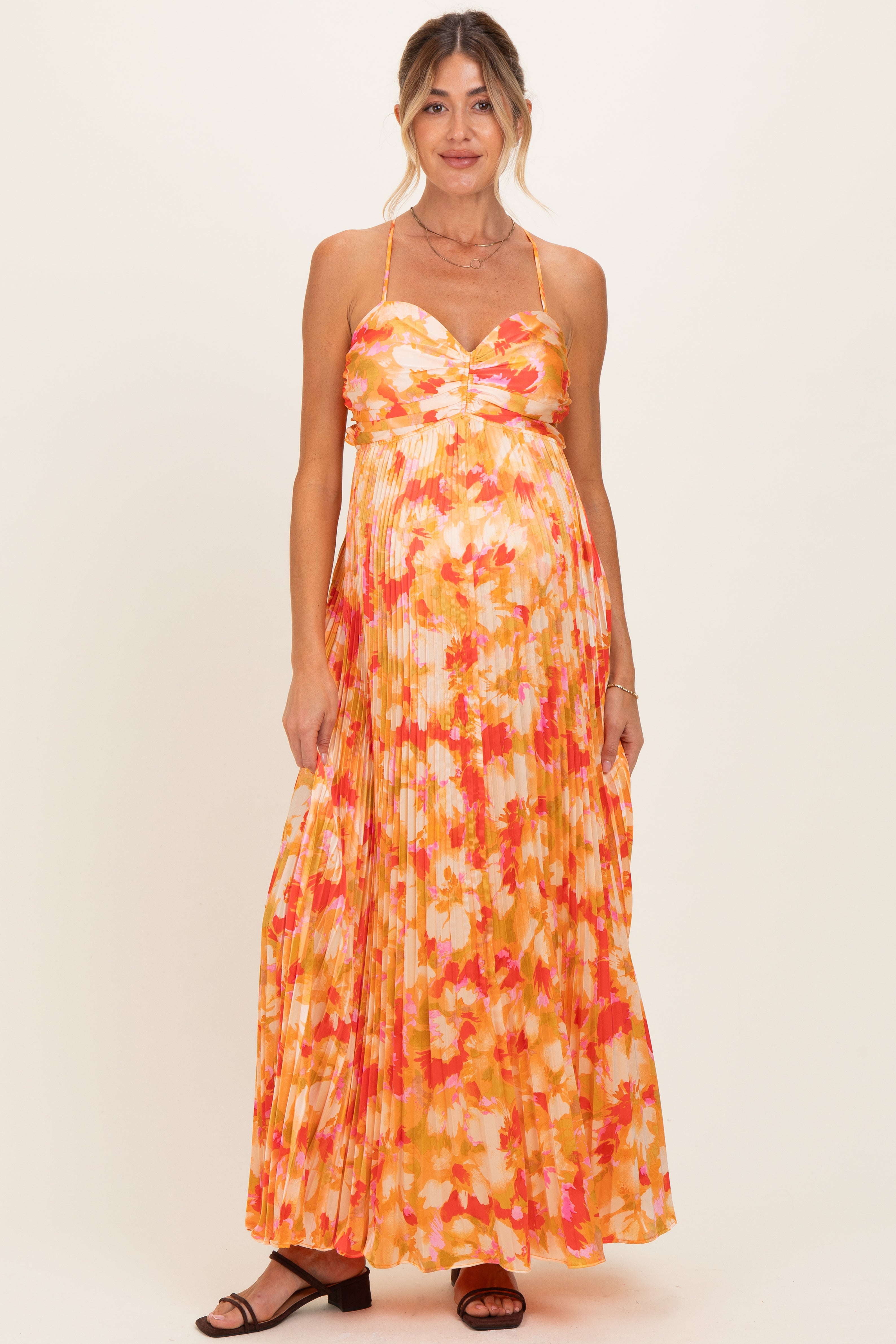Ärmelloses Umstands-Maxikleid mit Blumenmuster und Plissee