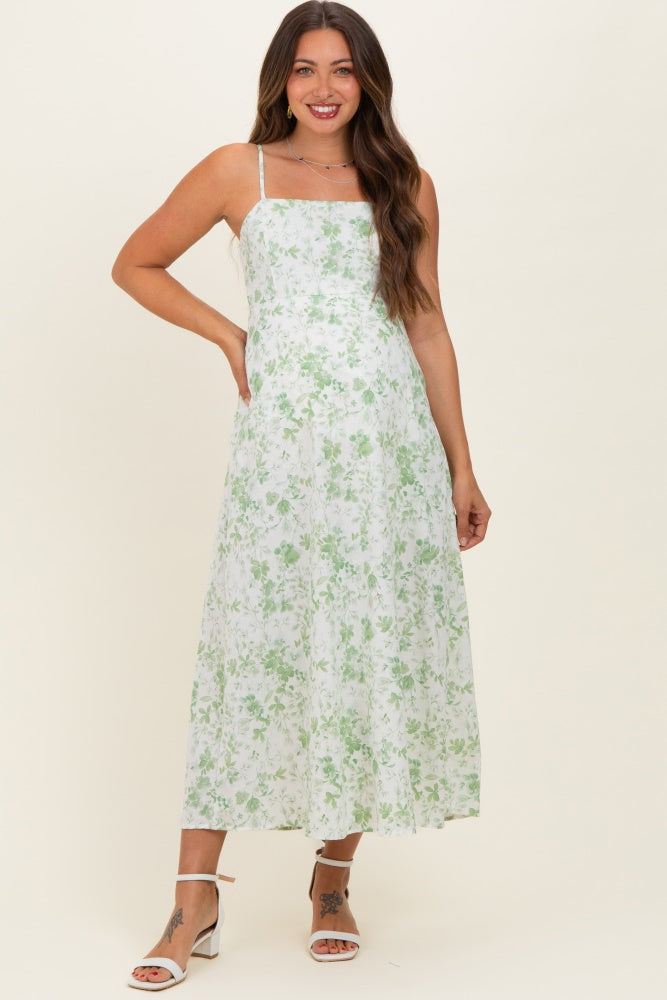 Hellgrünes ärmelloses Umstands-Midikleid mit Blumenmuster