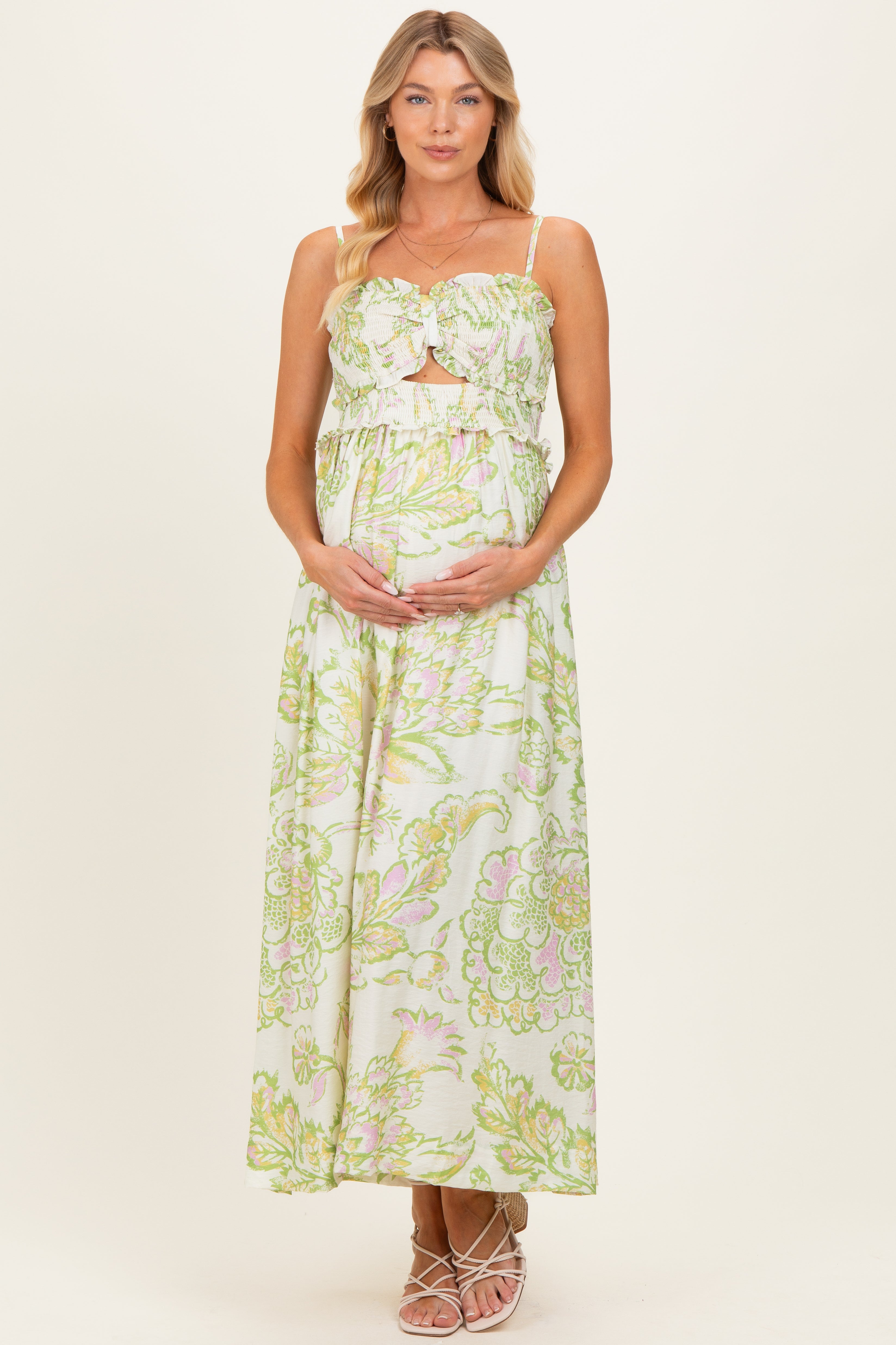 Elegantes florales Umstands-Maxikleid in Grün und Creme