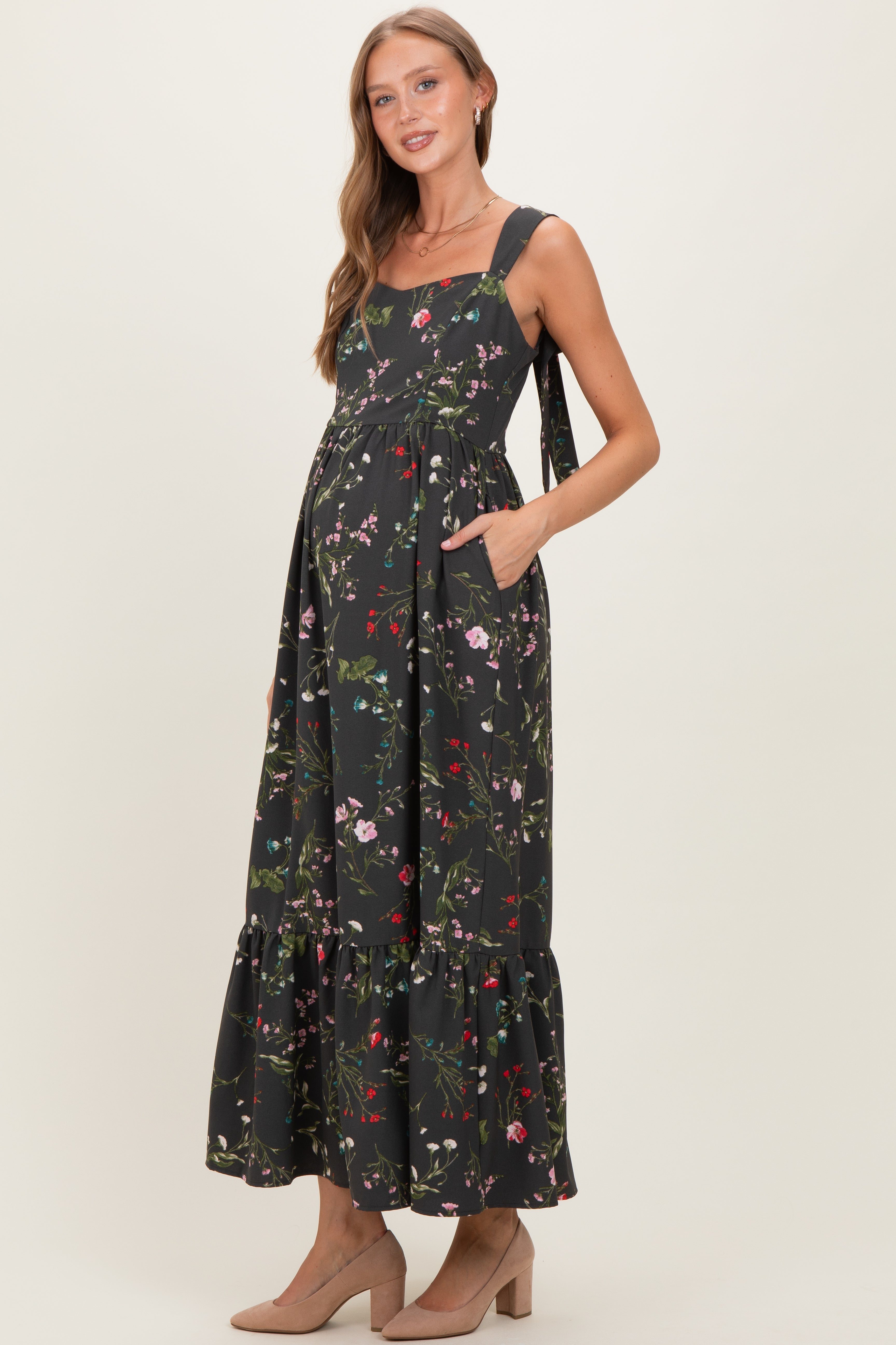 Umstandsmaxikleid in Waldgrün mit Blumenmuster und Schleifenträgern