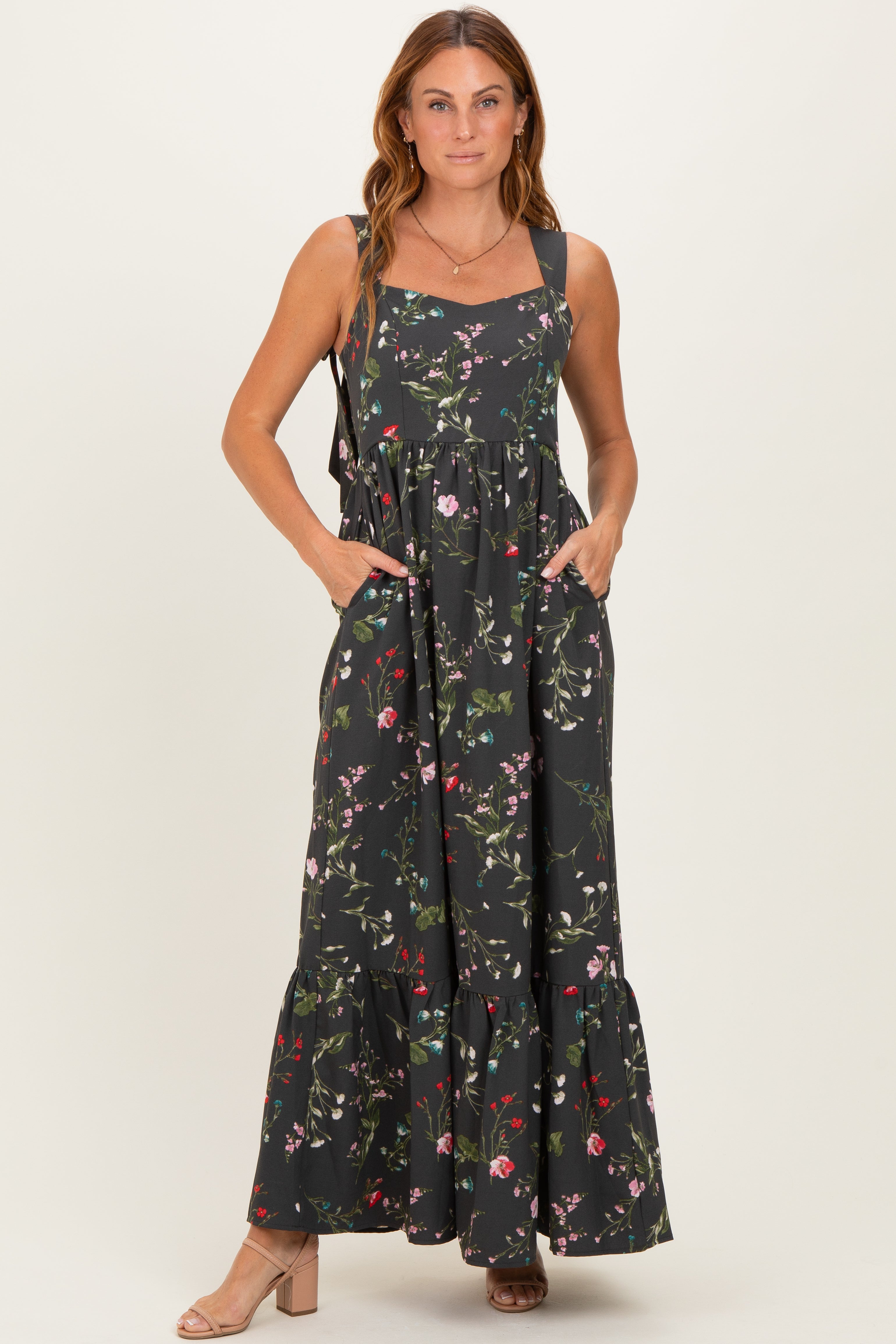Umstandsmaxikleid in Waldgrün mit Blumenmuster und Schleifenträgern