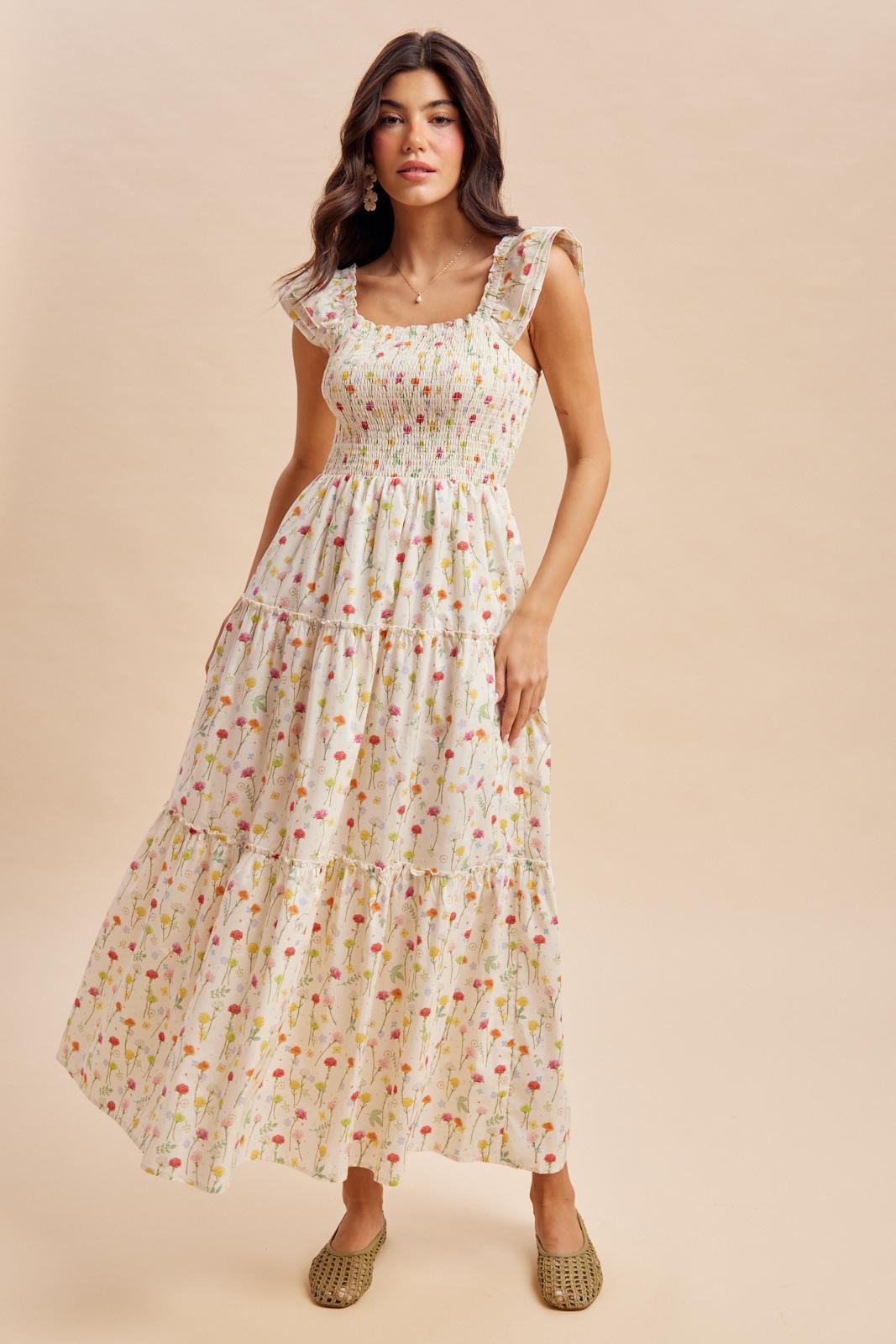 Florales Umstands-Maxikleid mit Smok-Detail in Creme
