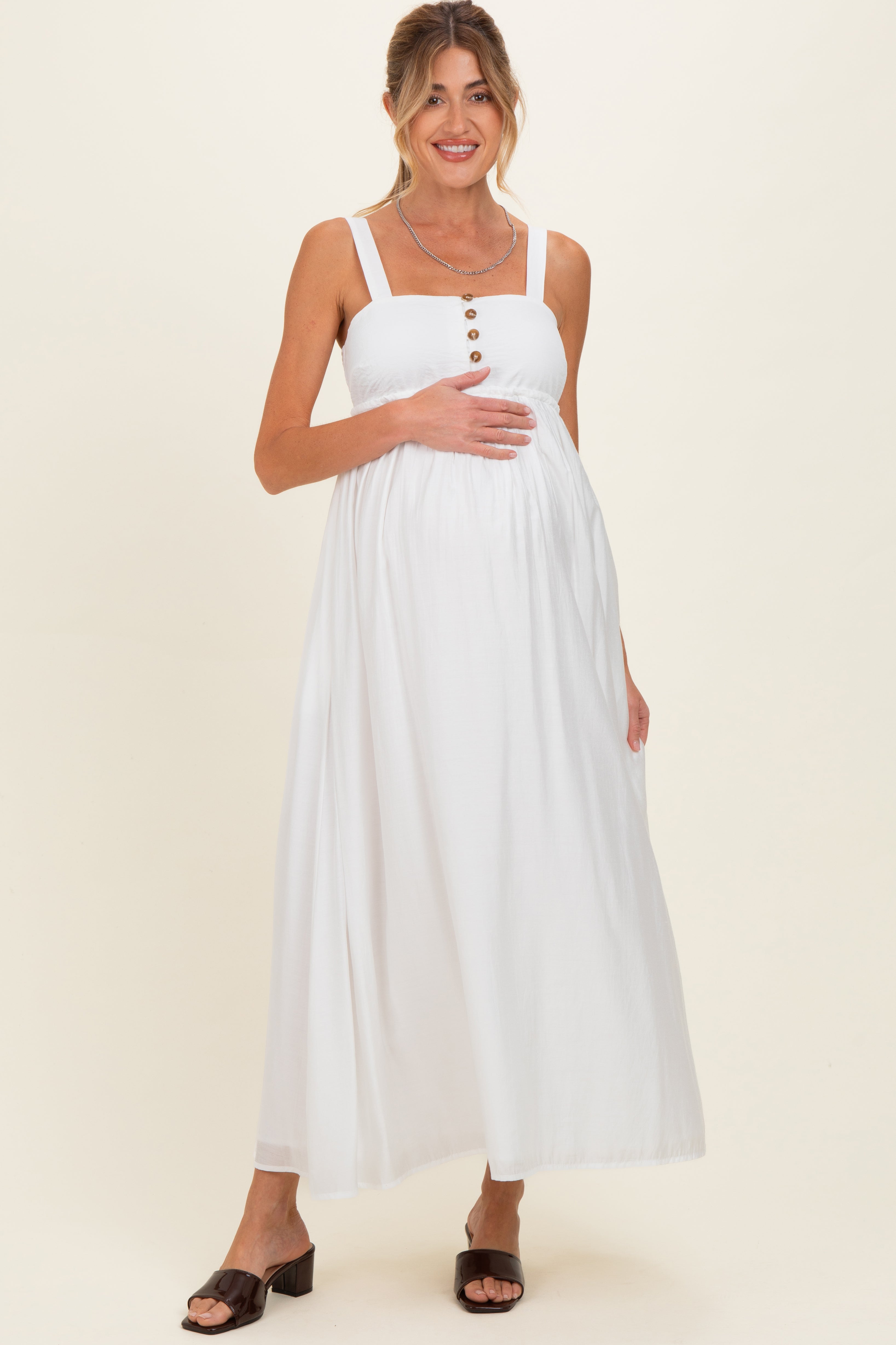 Elfenbeinfarbenes Umstands-Maxikleid mit eckigem Ausschnitt und Empire-Taille