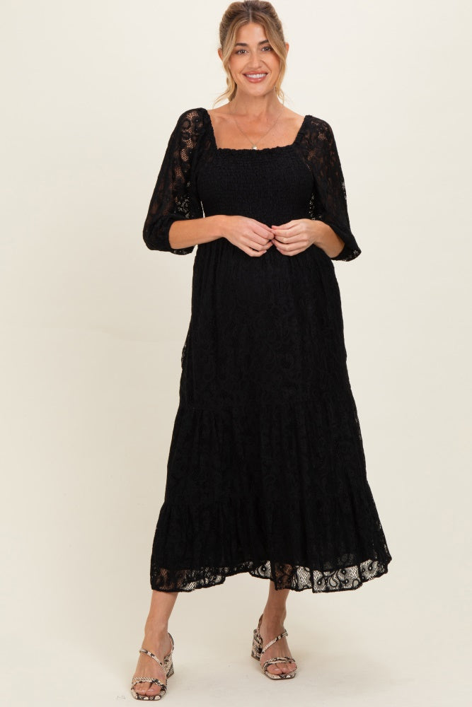 Schwarzes gesmoktes Umstands-Midikleid aus Spitze