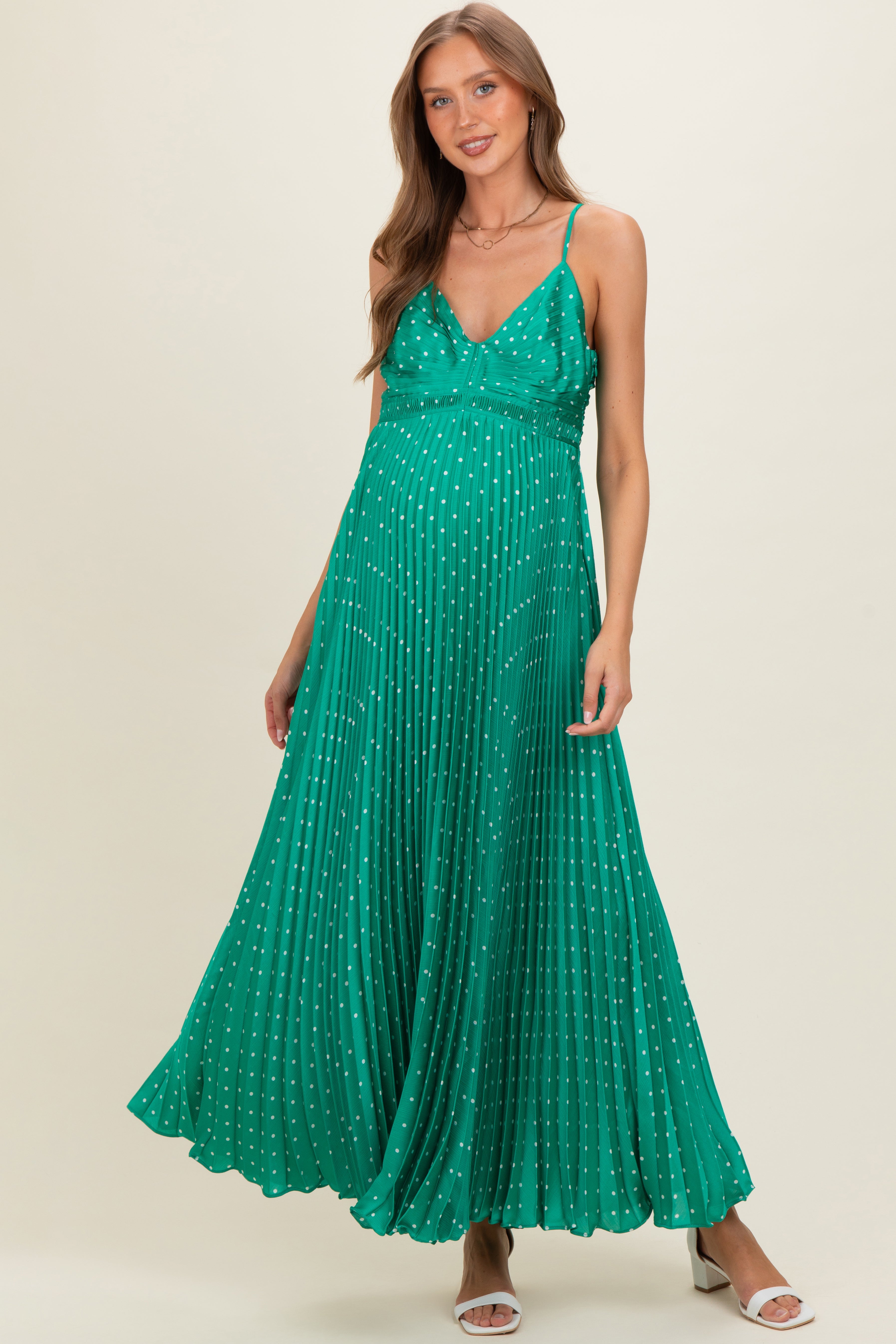 Grünes plissiertes Umstands-Maxikleid mit Punktemuster und Cut-out