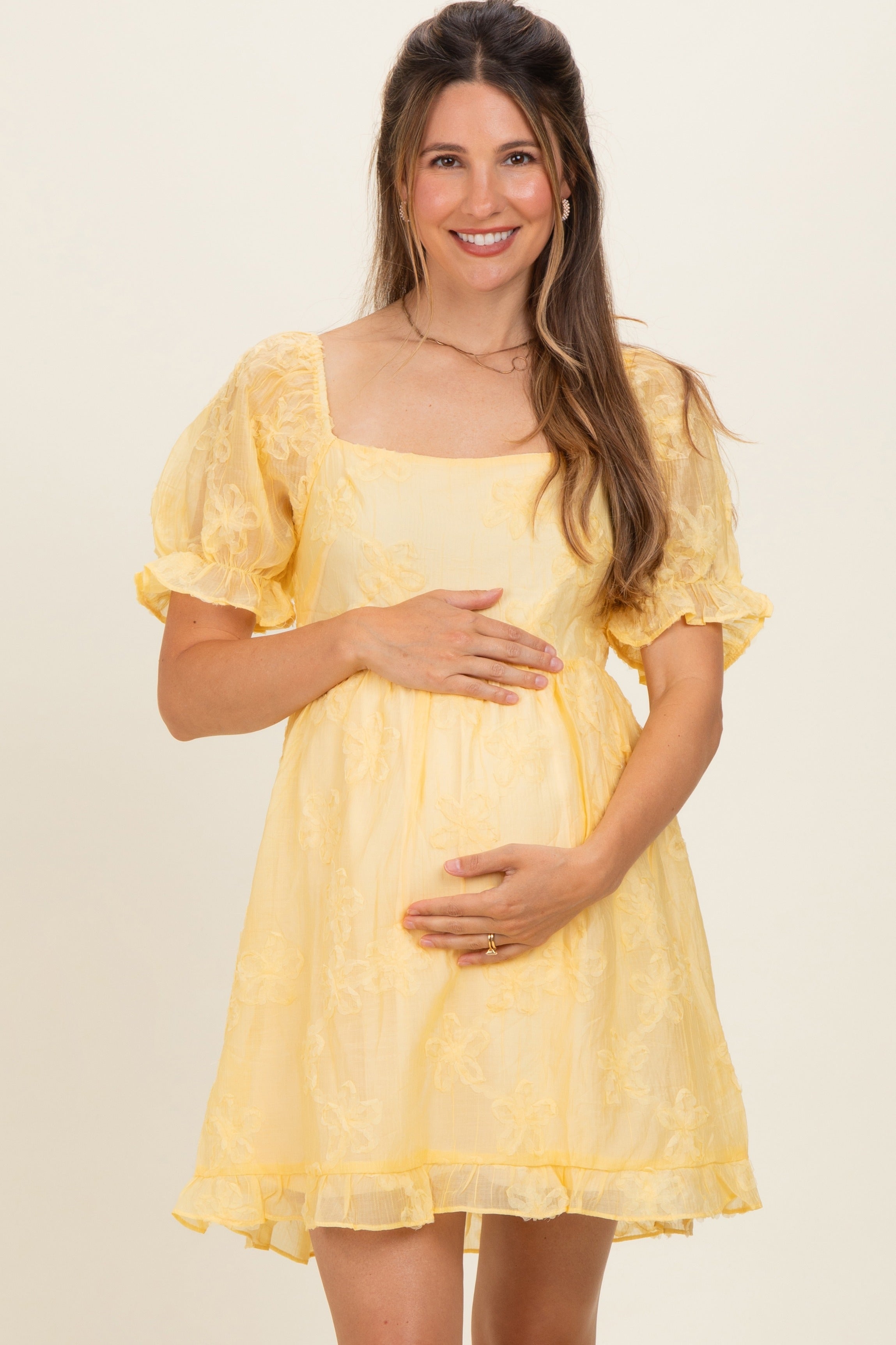 Umstands-Minikleid in Gelb mit Blüten-Applikation und Puffärmeln