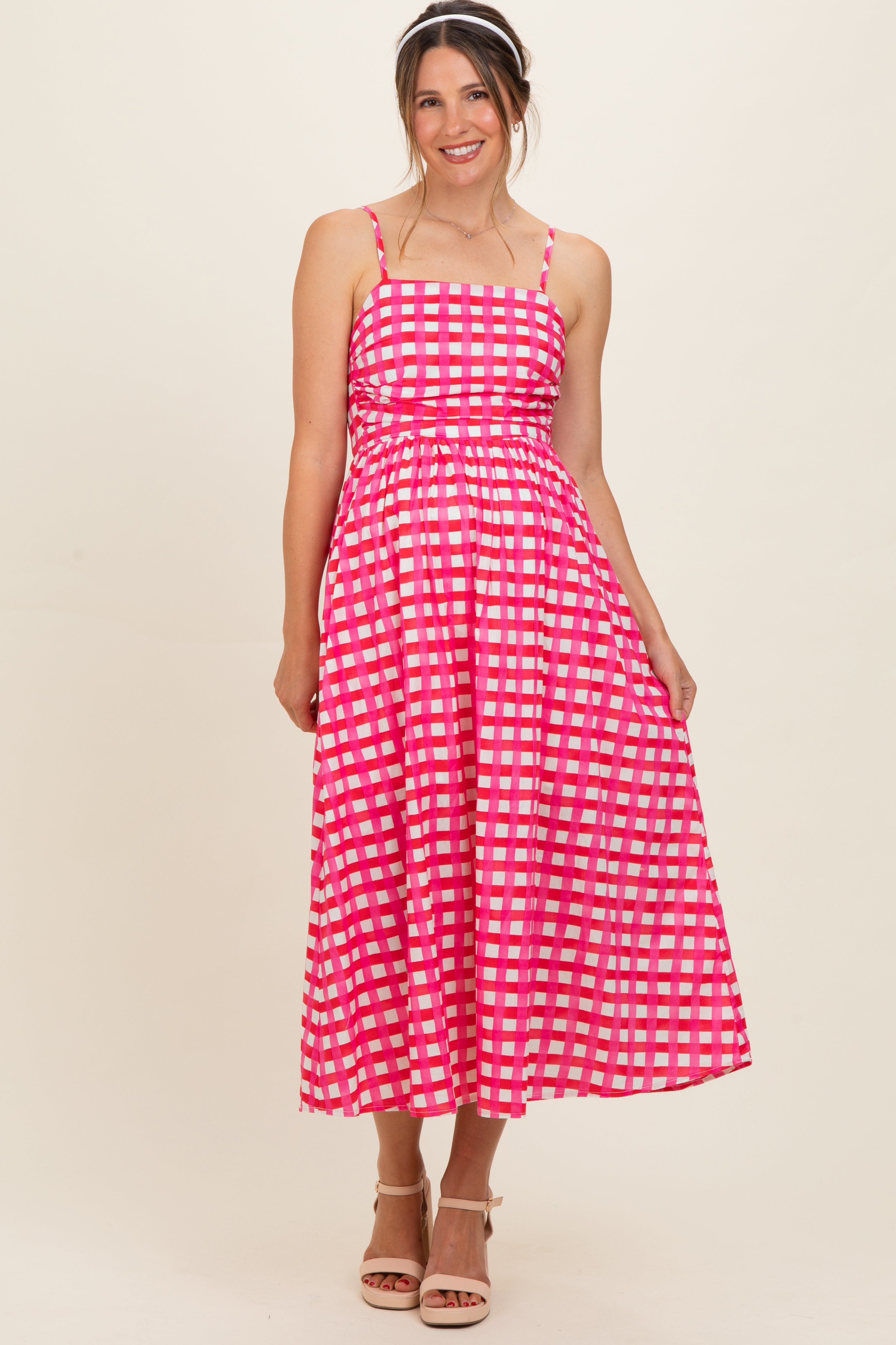 Pinkfarbenes Umstands-Midikleid mit Karomuster
