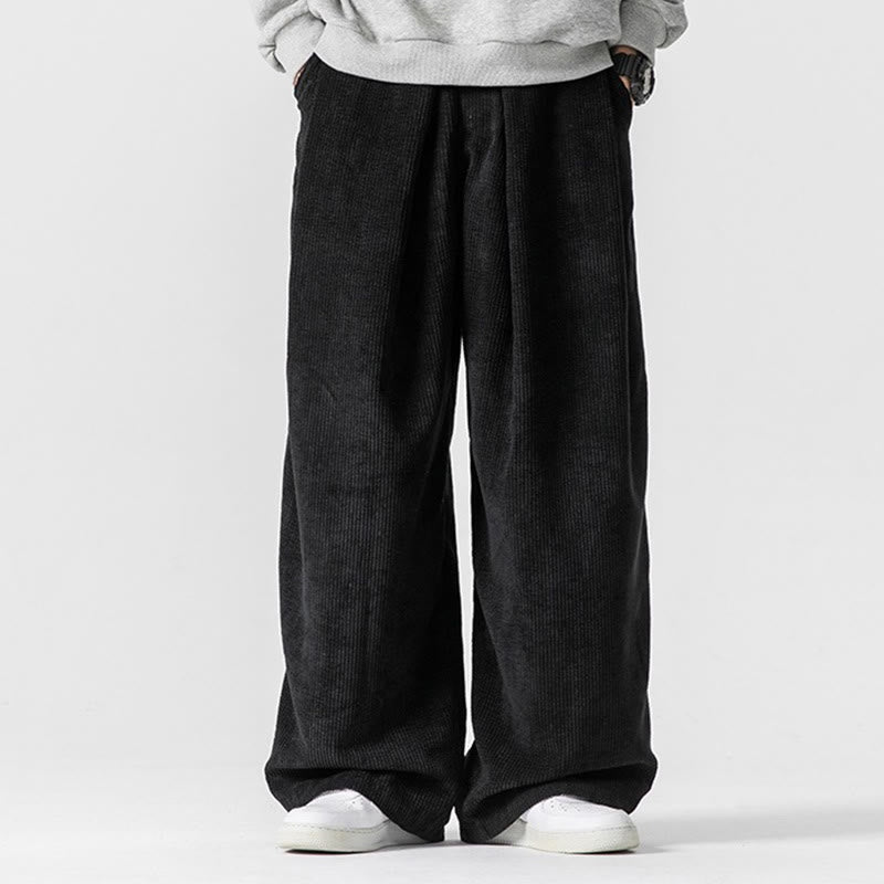 Einfarbige Herrenhose aus Baumwollcord mit weitem Bein und Taschen
