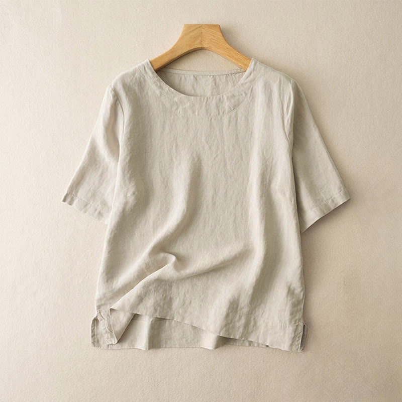 Schlichtes, einfarbiges, kurzärmliges Damen-T-Shirt aus Baumwolle mit Rundhalsausschnitt und Seitenschlitz