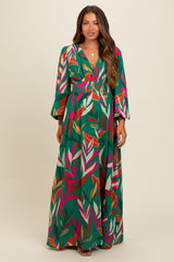 Umstands-Maxikleid mit Blätterprint und tiefem V-Ausschnitt