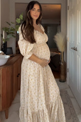 Cremefarbenes Umstands-Maxikleid mit Blumenmuster und Herzausschnitt