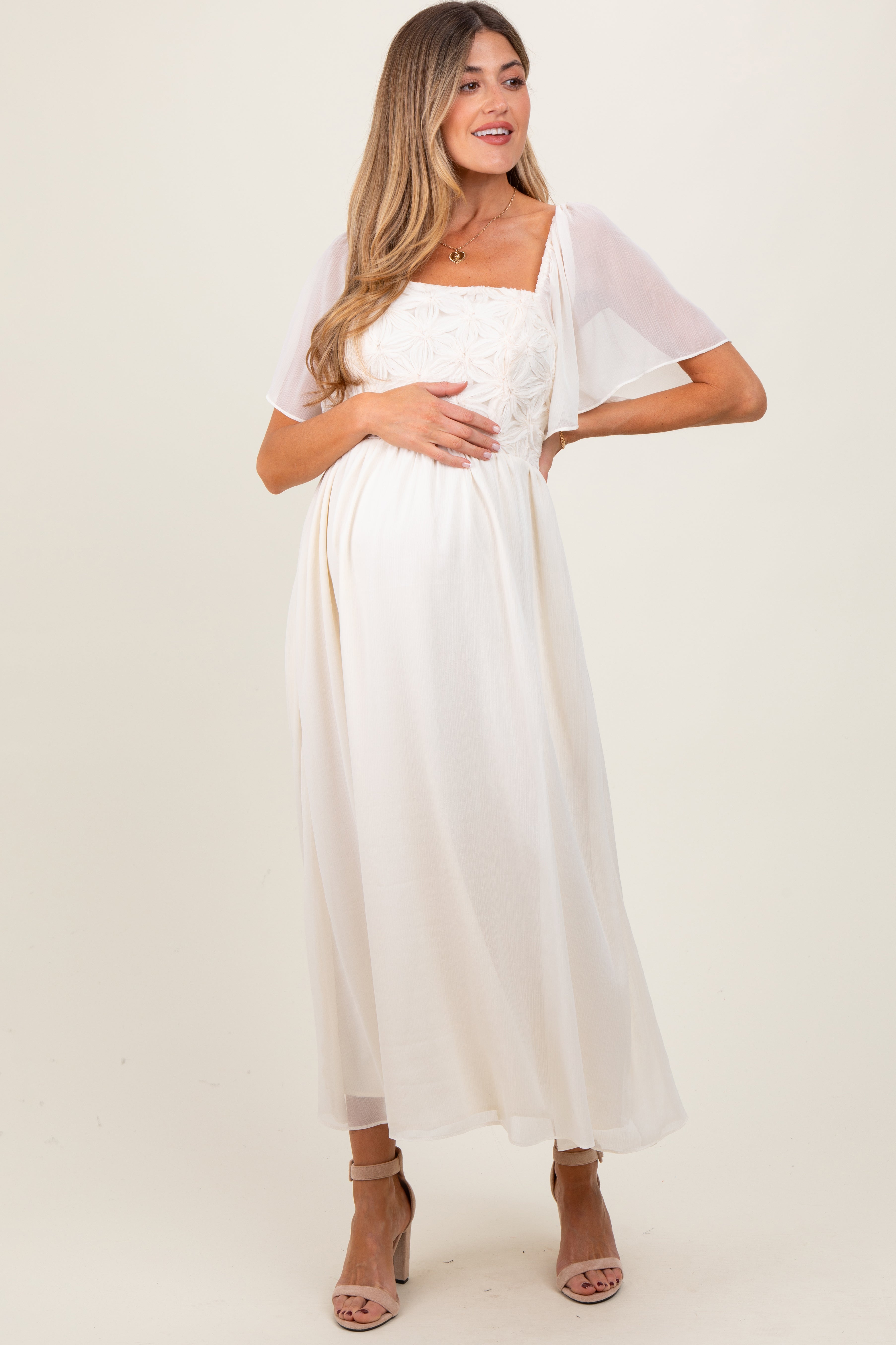 Umstands-Midikleid in Creme mit floraler Applikation und Flügelärmeln