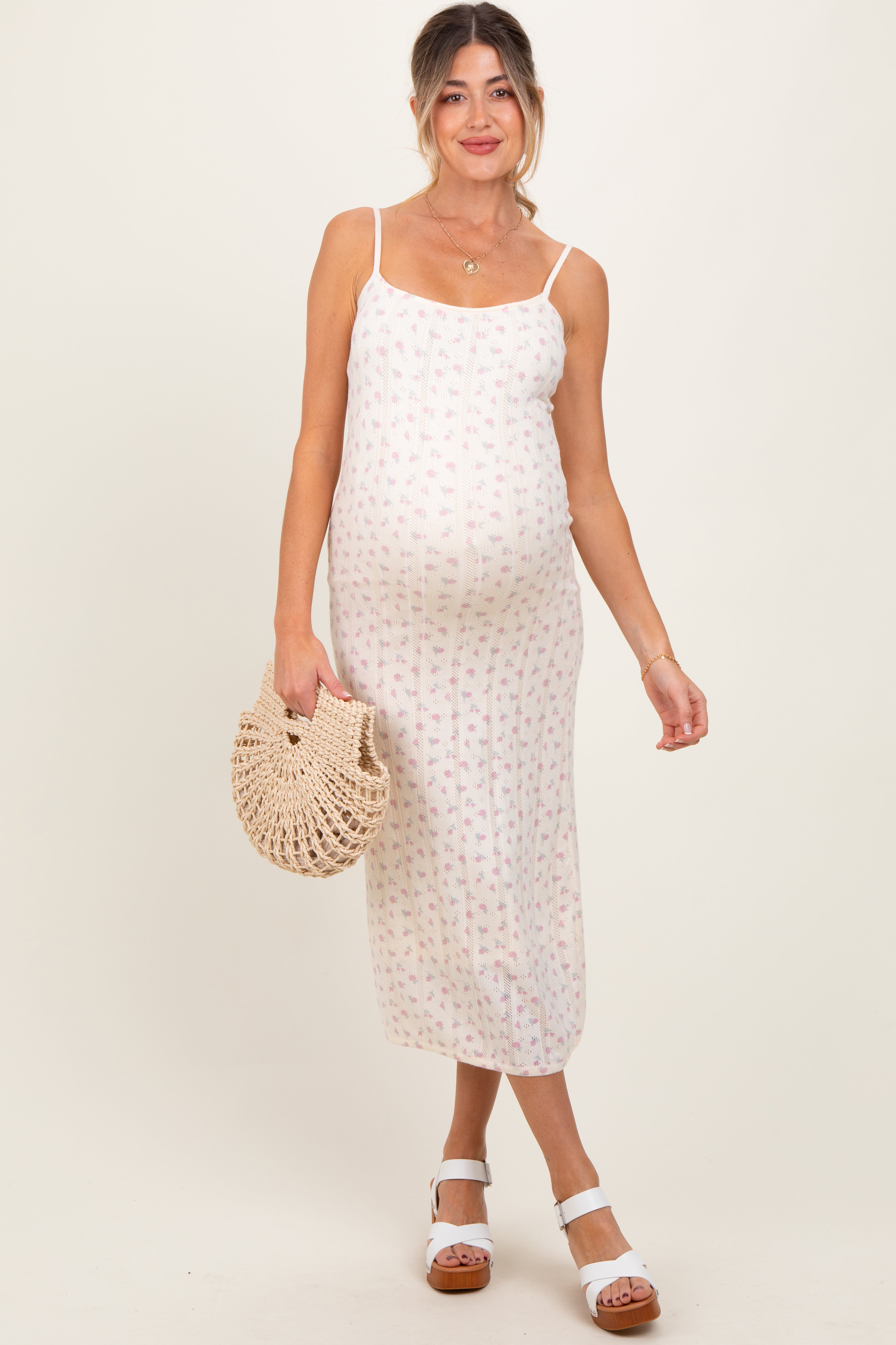Elfenbeinfarbenes Umstands-Midikleid aus Pointelle-Strick mit Blumenmuster