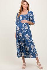 Blaues Umstands-Midikleid mit Smok-Einsatz und Puffärmeln