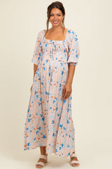 Umstands-Maxikleid mit Blumenmuster, Smok-Bund und Bindeband