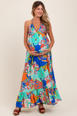 Umstands-Maxikleid in Königsblau mit Blumenmuster, Neckholder, Cut-out und Rückenbindung