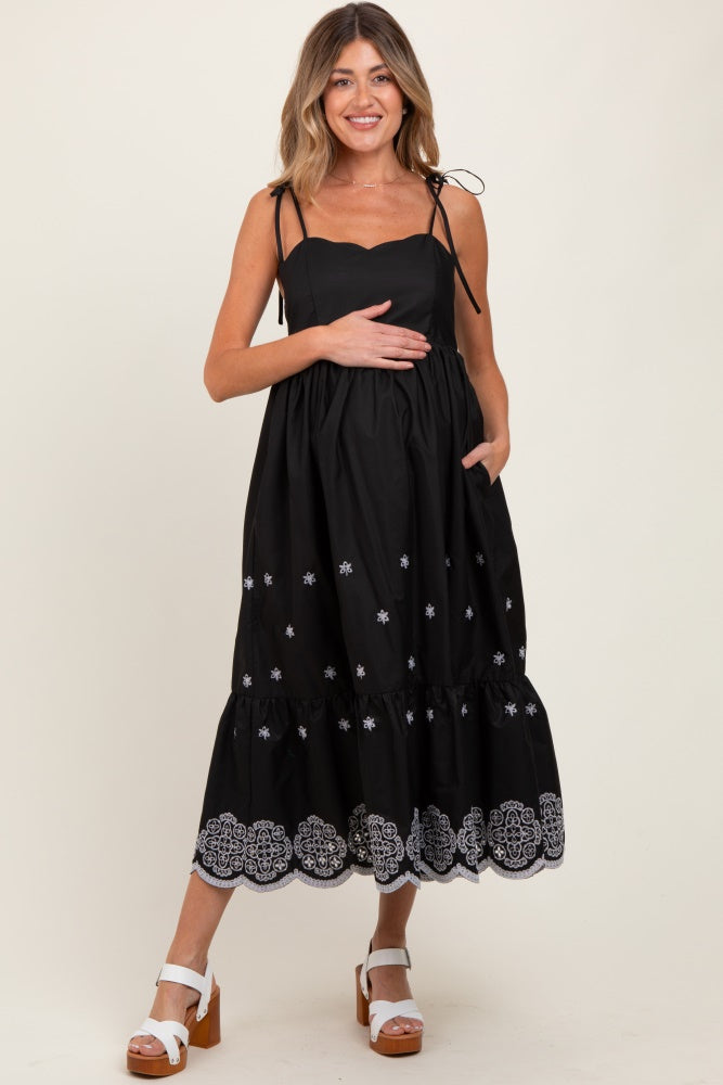 Schwarzes besticktes Umstands-Midikleid mit Schulterbändern