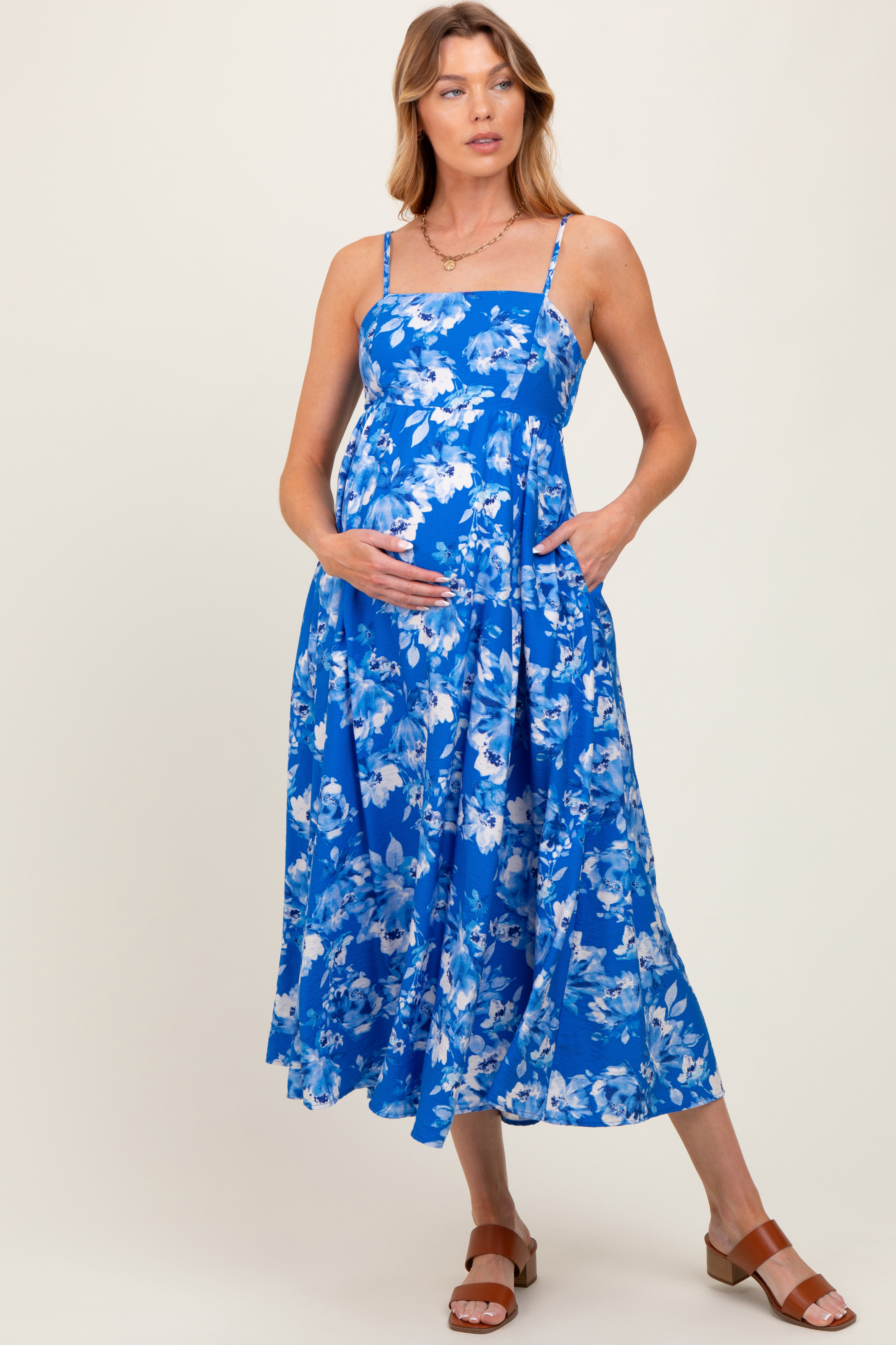 Königsblaues Umstands-Midikleid mit Blumenmuster, Rückenschnürung und Cut-out