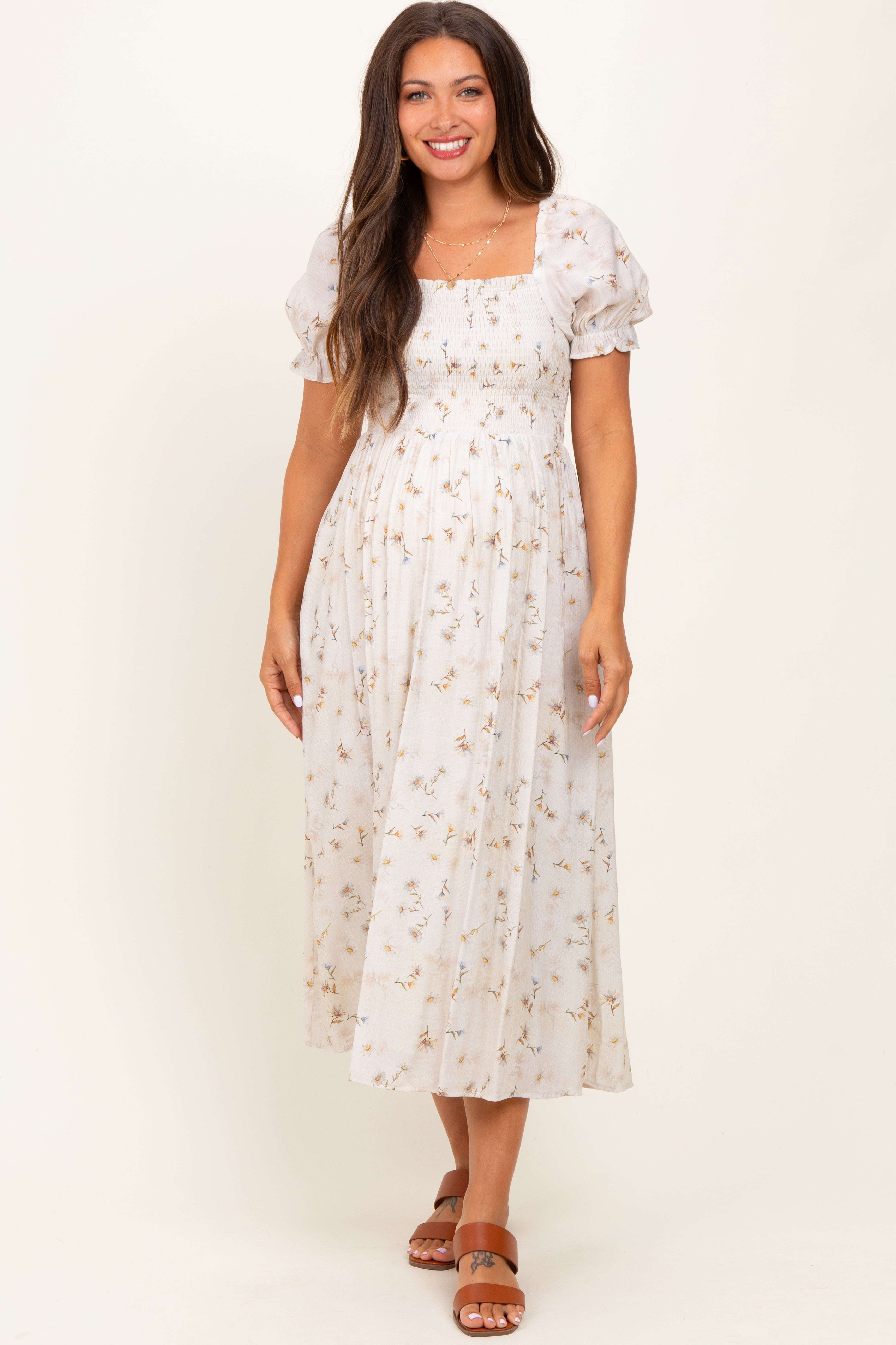 Gelbes geblümtes Umstands-Midikleid mit Puffärmeln