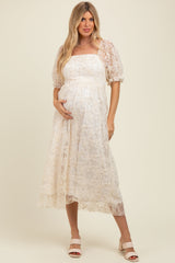 Umstands-Midikleid mit floralem Mesh-Overlay und Bindeband am Rücken