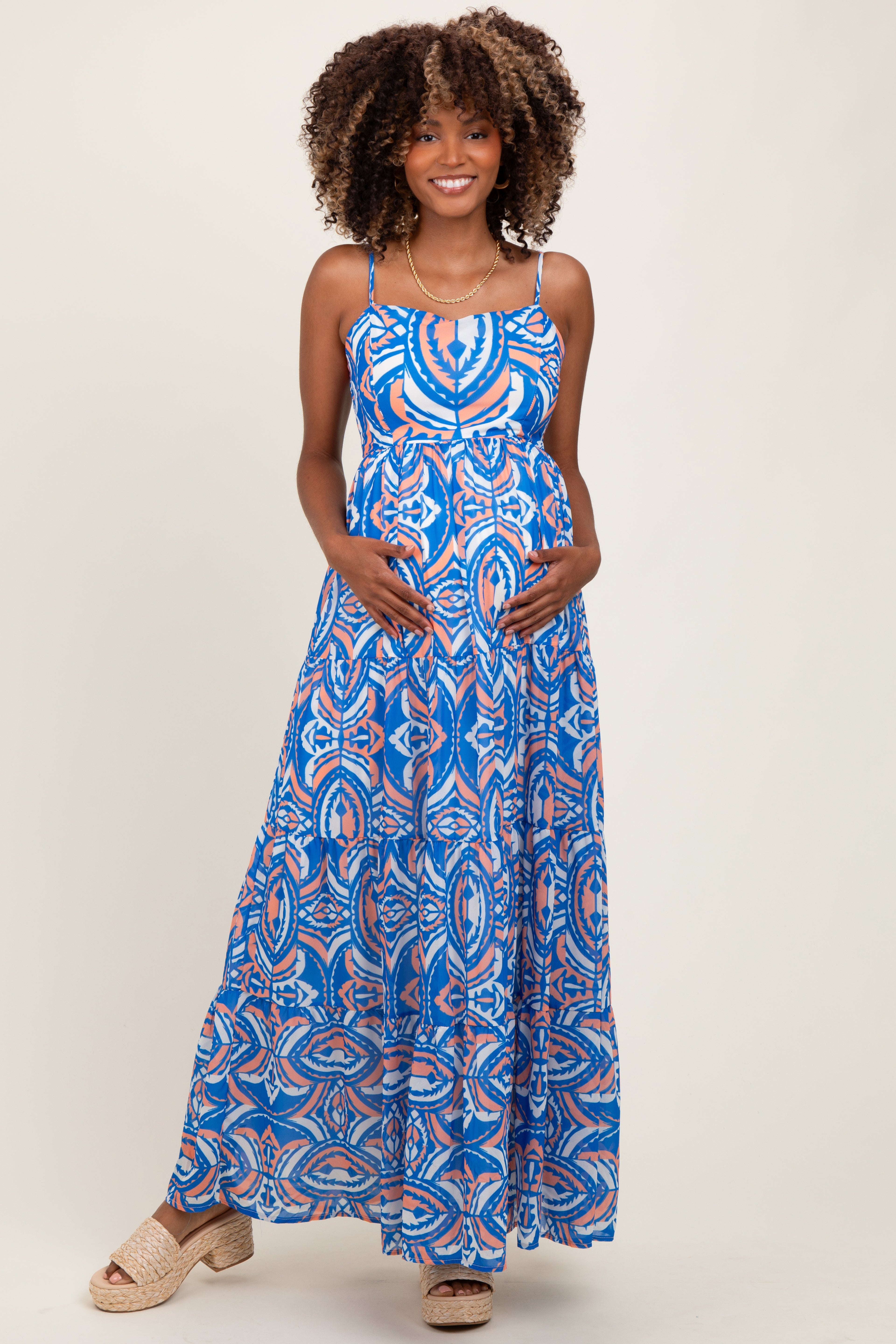 Blaues bedrucktes ärmelloses Umstands-Maxikleid