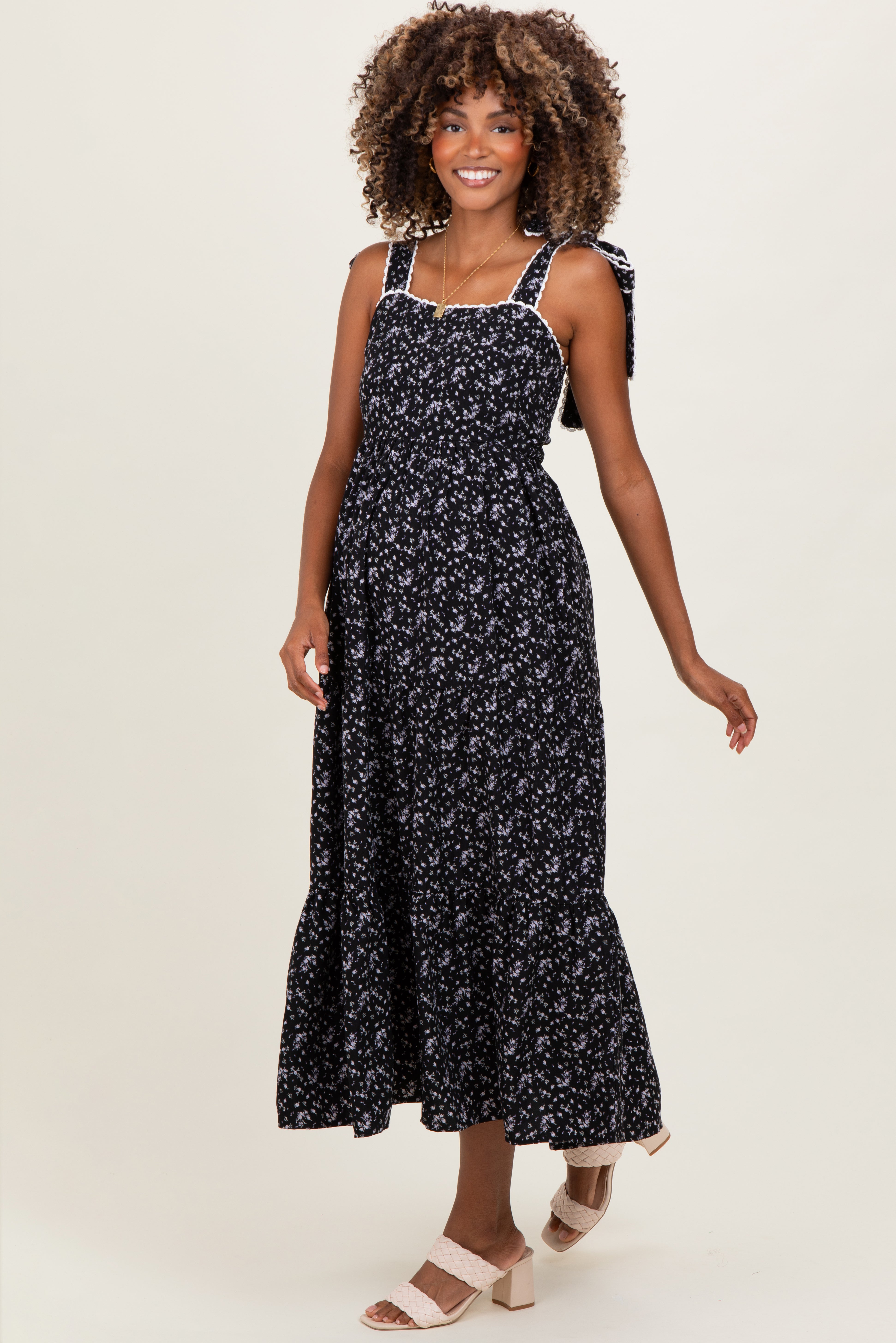 Schwarzes florales Umstands-Maxikleid mit Spitzenbesatz und Schulterbindern