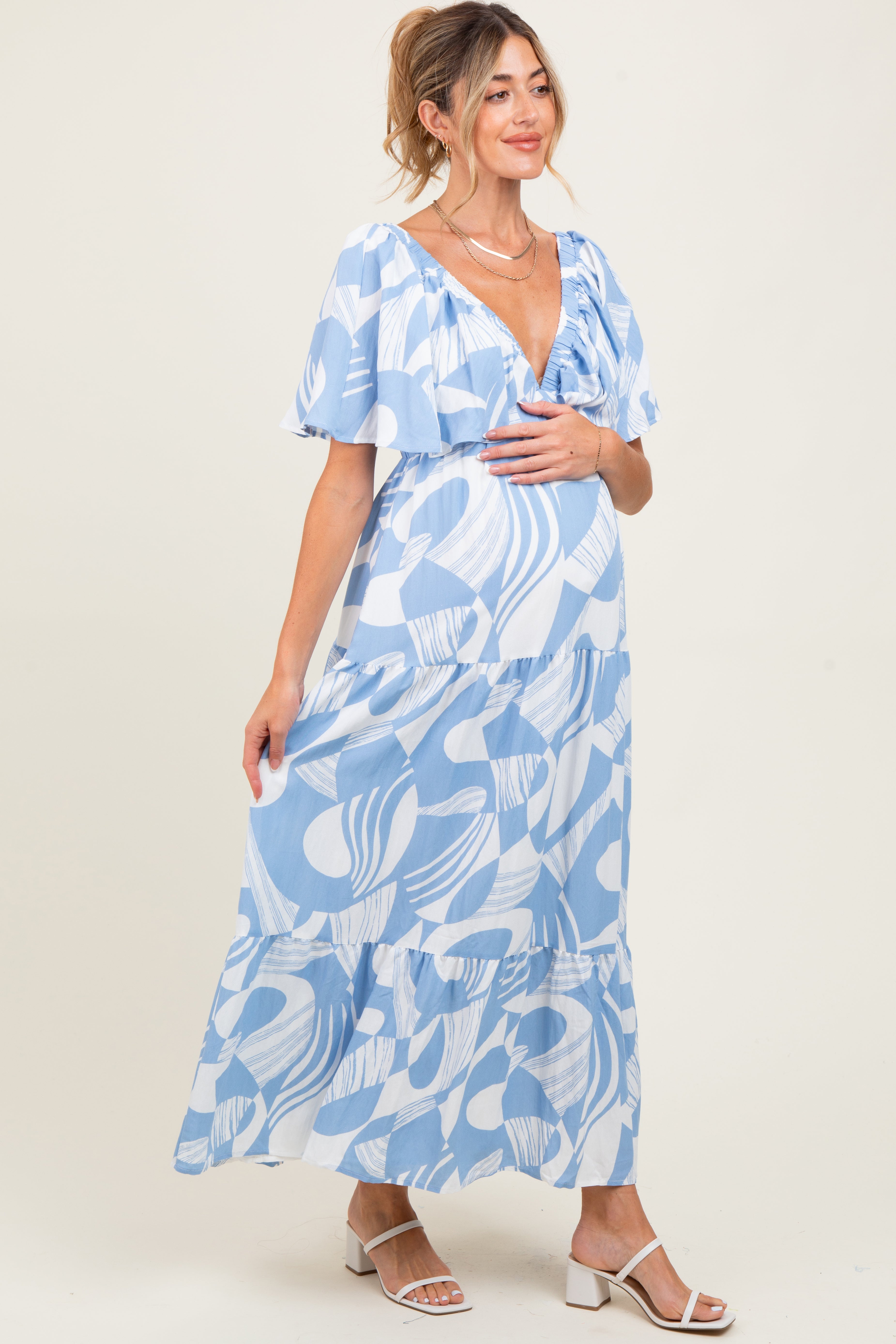 Ärmelloses Umstands-Maxikleid mit Print und geschmocktem Rücken in Blau