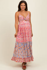 Rosa Umstands-Maxikleid mit Blumenmuster, Twist-Front, Cut-out und Stufenrock