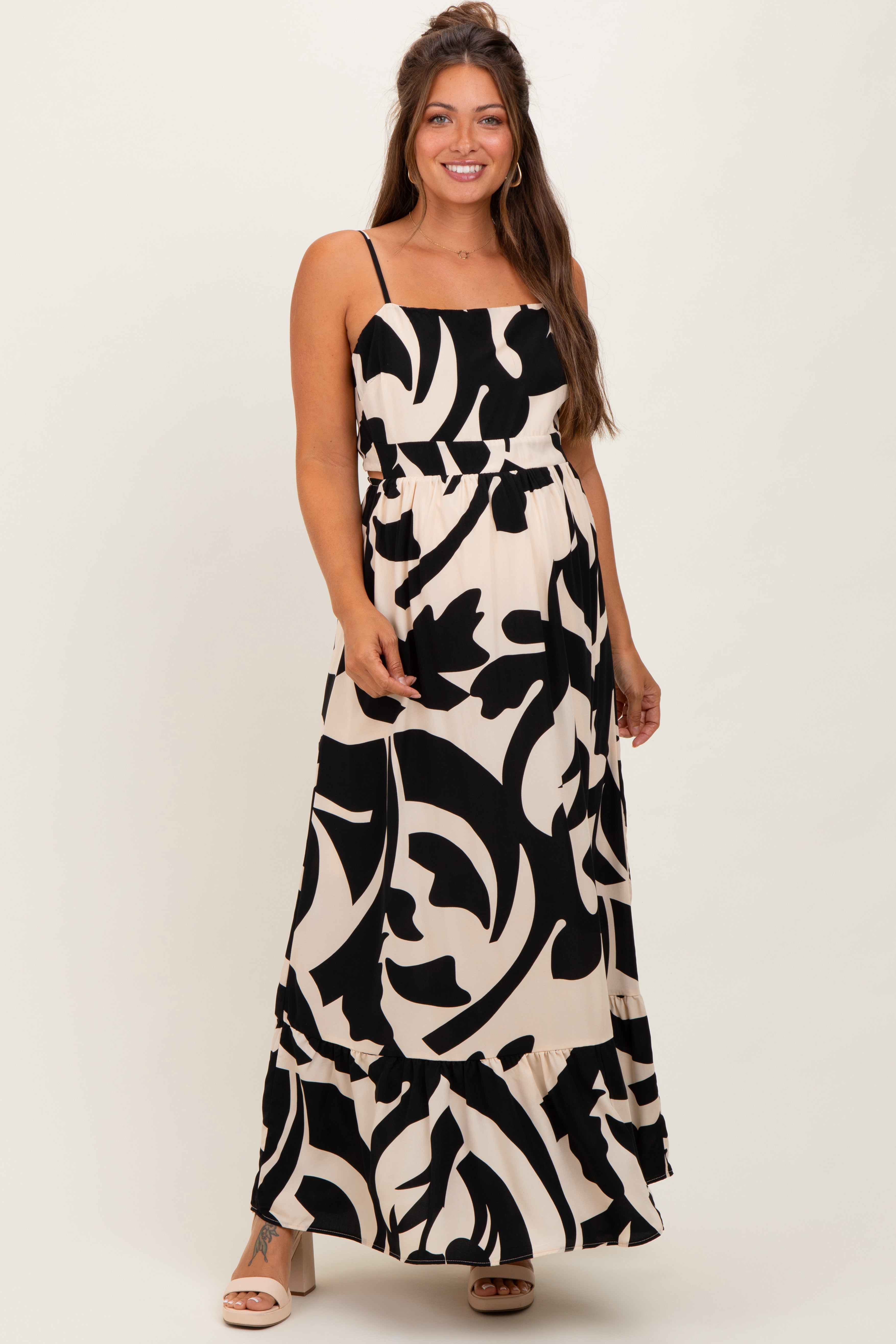 Schwarzes ärmelloses Umstands-Maxikleid mit Print, Cut-outs und Bindeband am Rücken