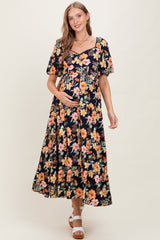 Marineblaues Umstands-Maxikleid mit Blumenmuster, Stufenrock und Puffärmeln