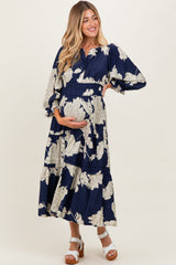 Marineblaues Umstands-Midikleid mit Blumenmuster, 3/4-Ärmeln und Stufenrock