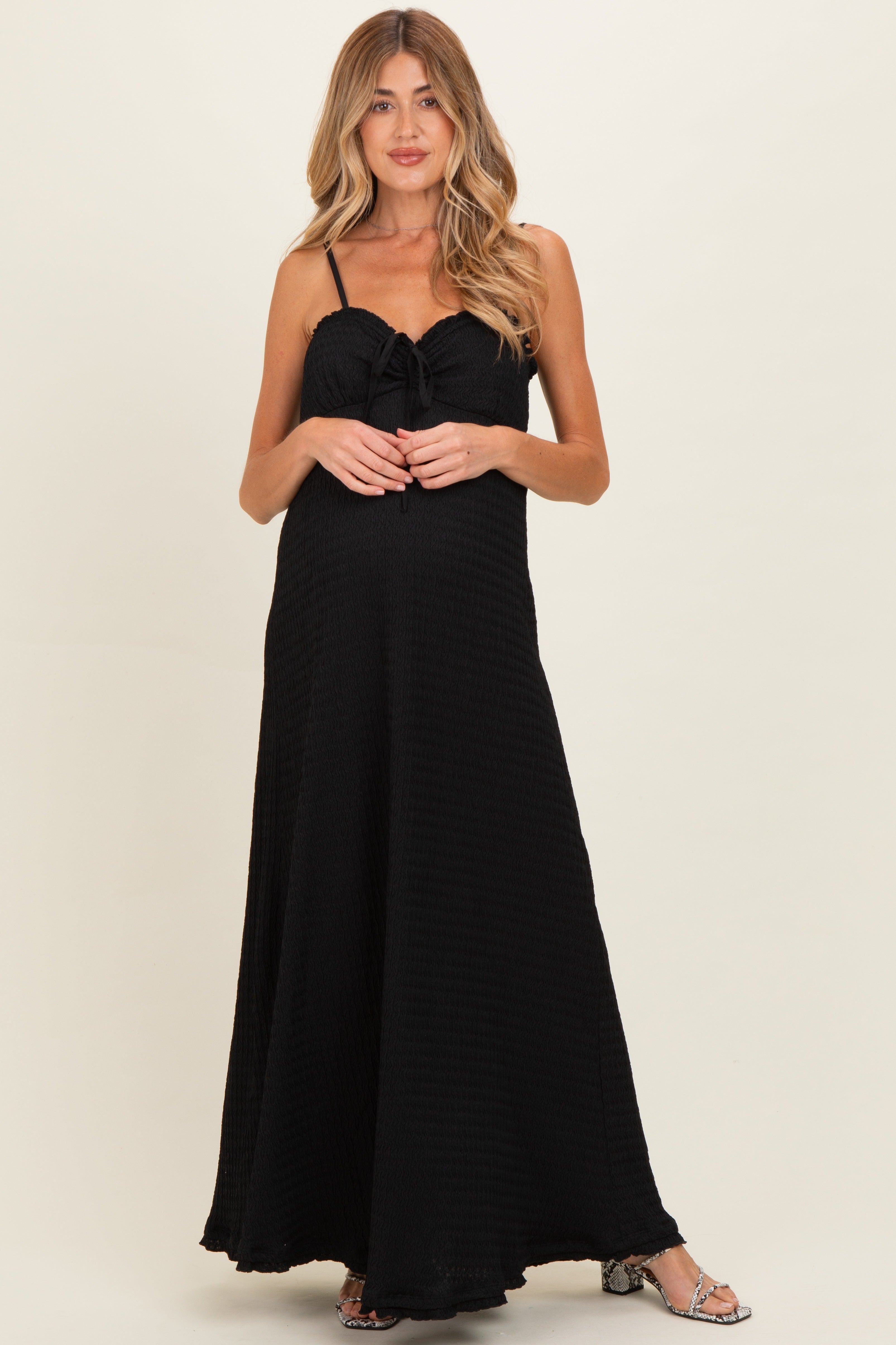 Schwarzes ärmelloses Umstands-Maxikleid aus Waffelstrick mit Herzausschnitt