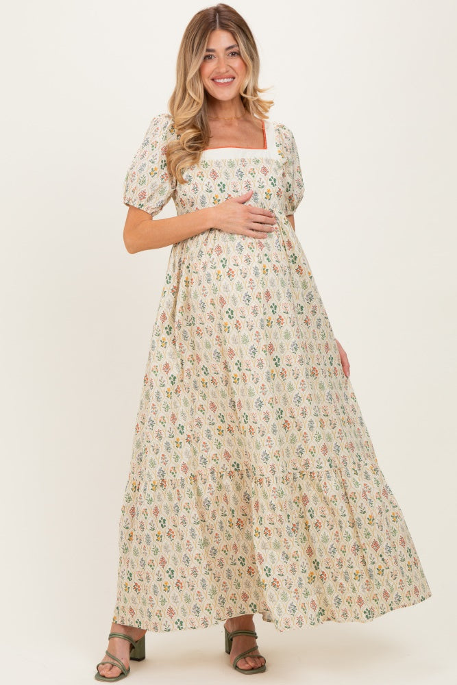 Umstandsmaxikleid aus Baumwolle mit Blumenmuster und Puffärmeln in Creme