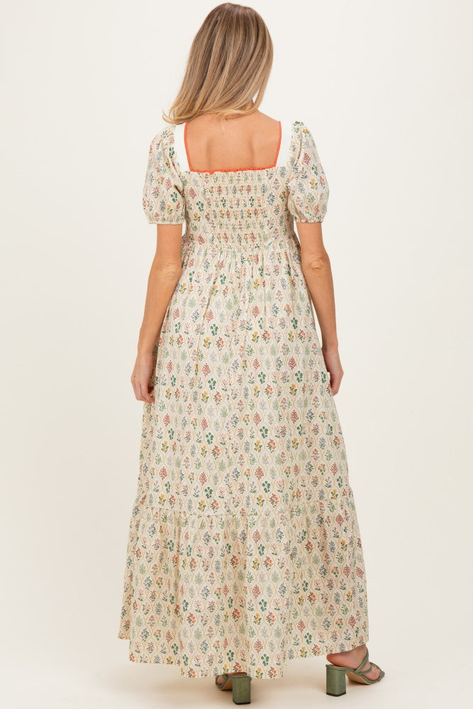 Umstandsmaxikleid aus Baumwolle mit Blumenmuster und Puffärmeln in Creme