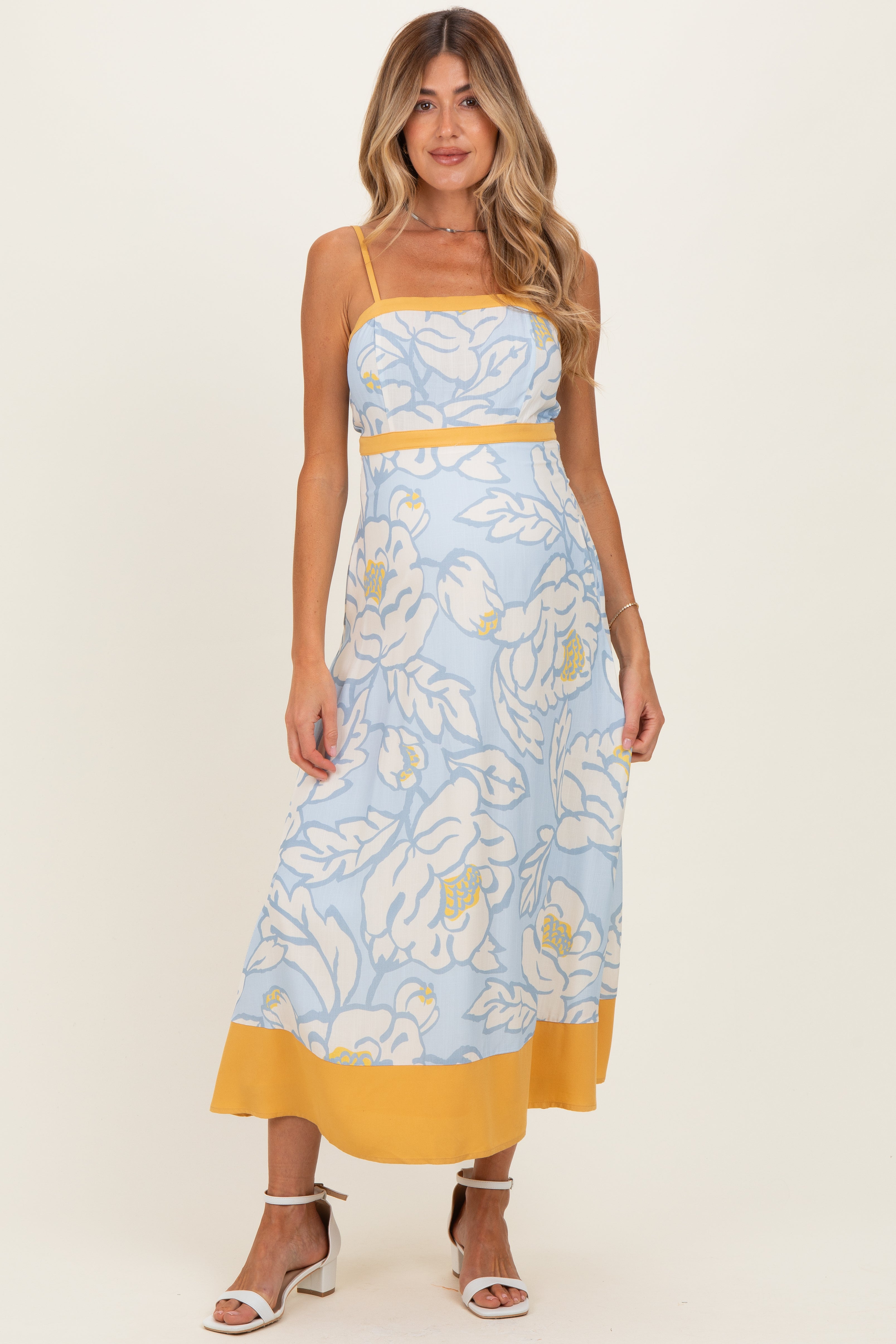 Ärmelloses fließendes Umstands-Maxikleid mit Blumenmuster