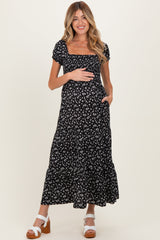 Umstands-Maxikleid in Schwarz mit Blumenprint, Smok-Oberteil und Puffärmeln