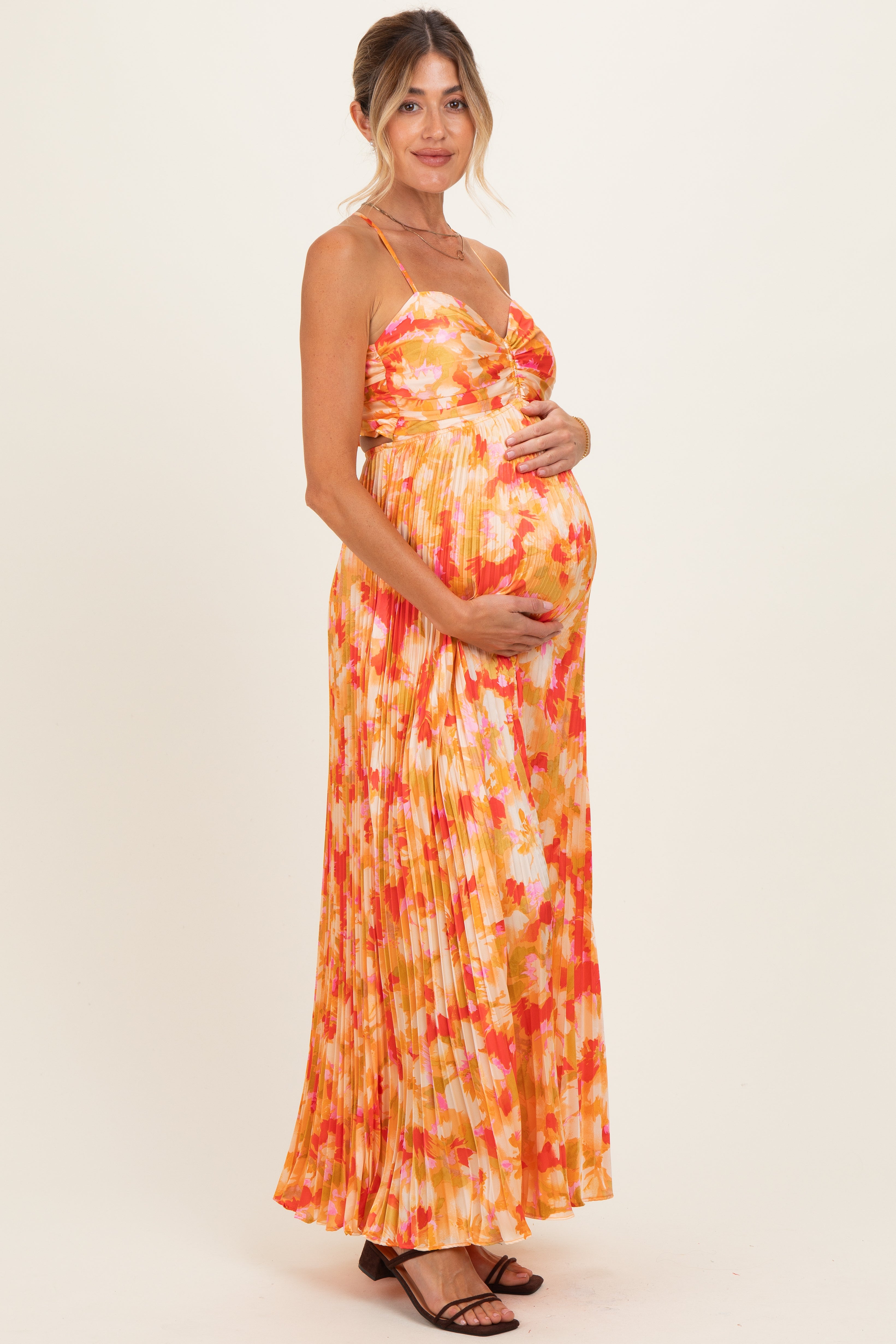Ärmelloses Umstands-Maxikleid mit Blumenmuster und Plissee