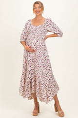 Umstands-Maxikleid in Creme mit floralem Smok-Detail und Zipfelsaum