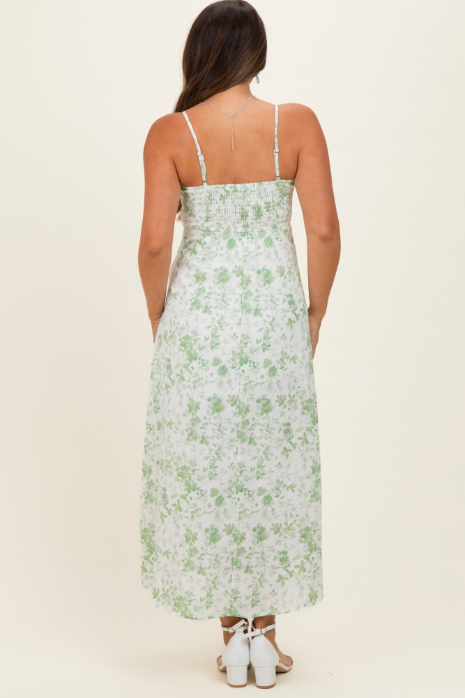 Hellgrünes ärmelloses Umstands-Midikleid mit Blumenmuster
