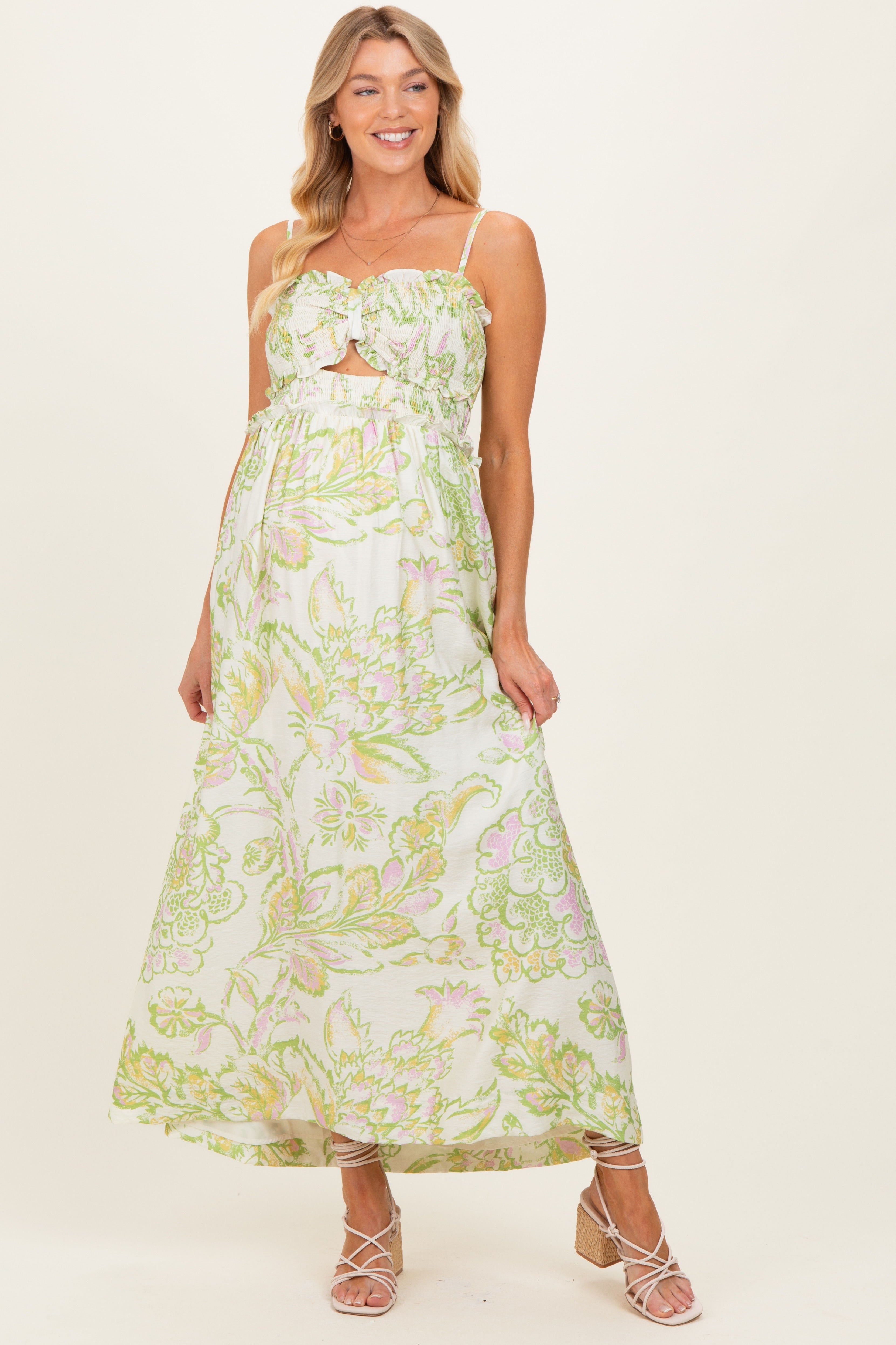 Elegantes florales Umstands-Maxikleid in Grün und Creme