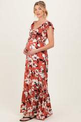 Gesmoktes Umstandsmaxikleid mit Blumenmuster und Raffung